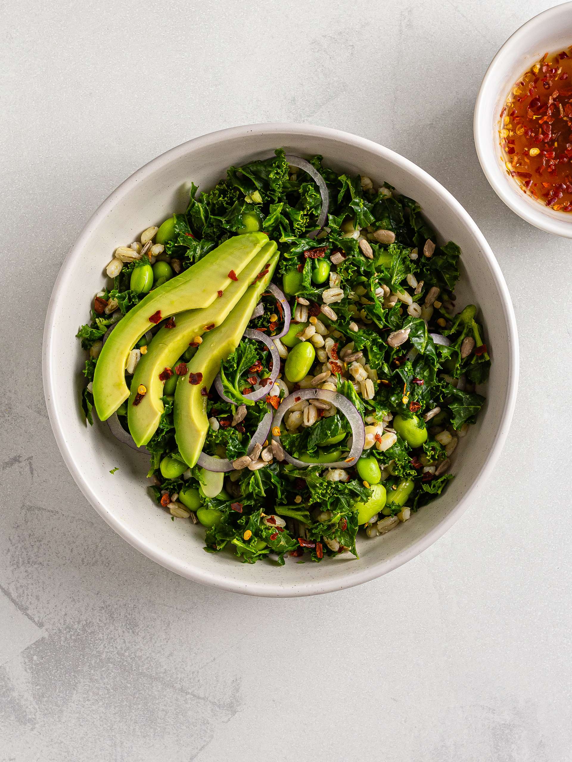 Kale edamame salad with avocado and red onions