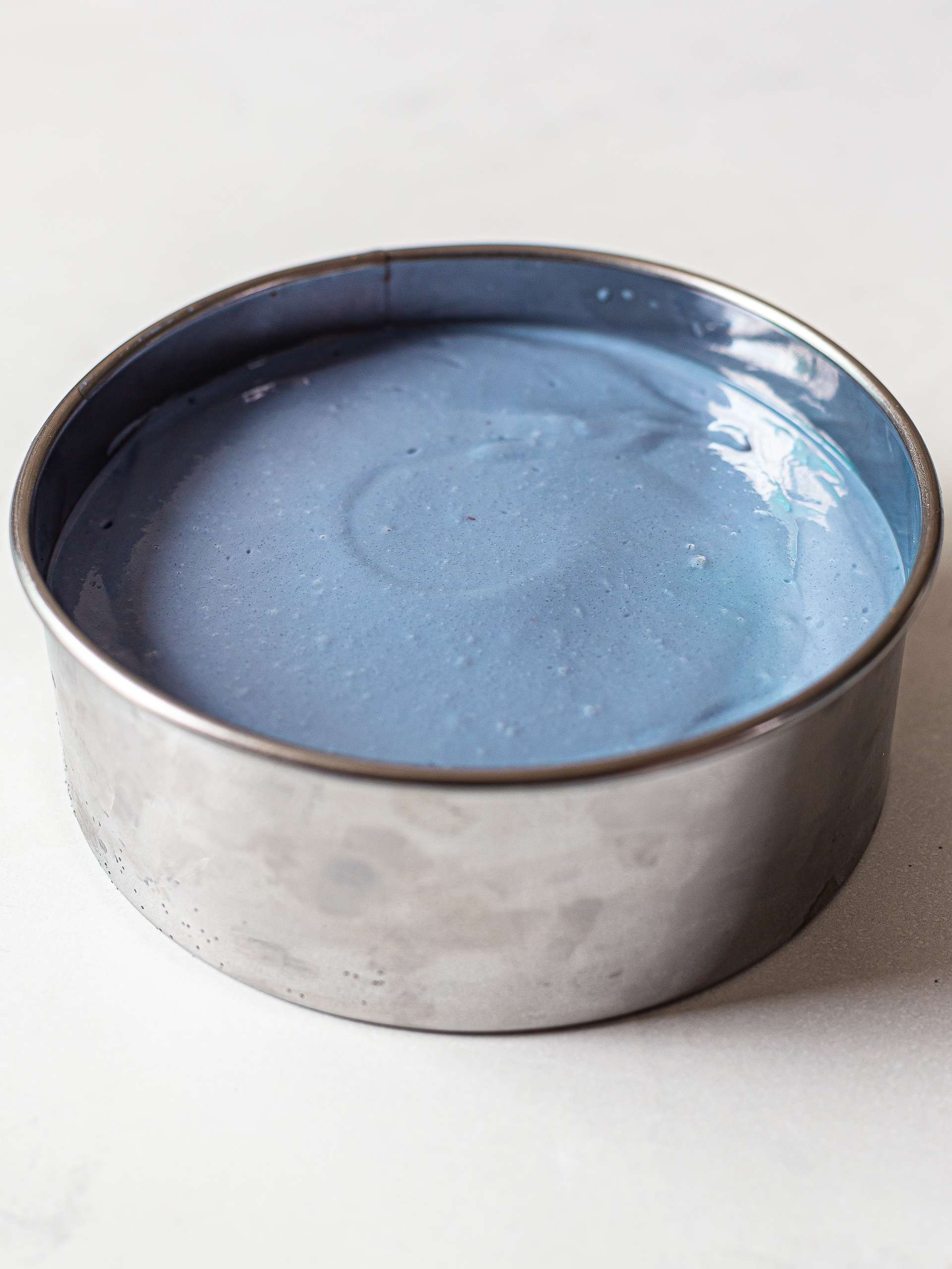 blue pea flower cheesecake cream in a tin