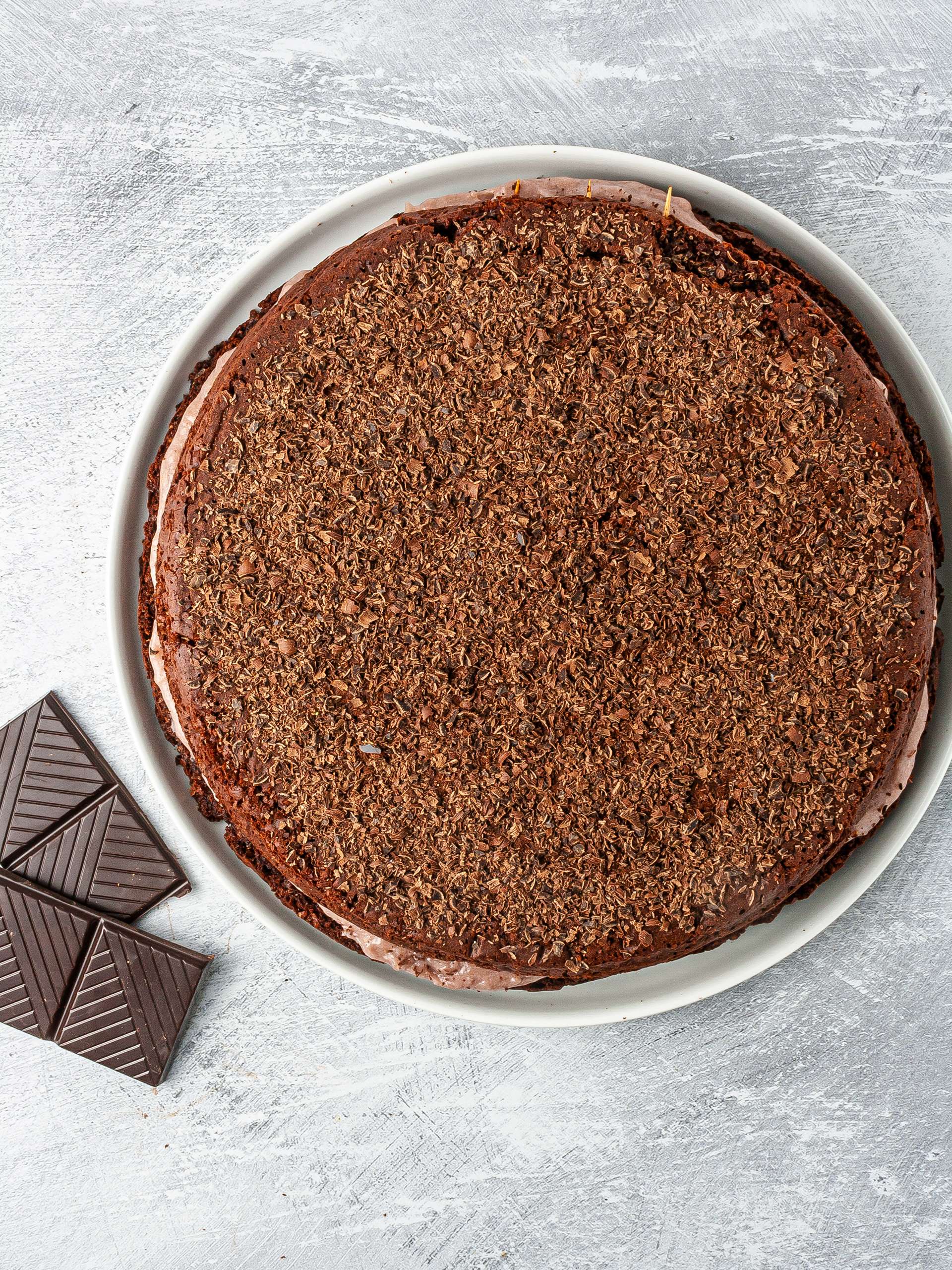 Chocolate lavender cake with lavender tea filling and dark chocolate shavings.