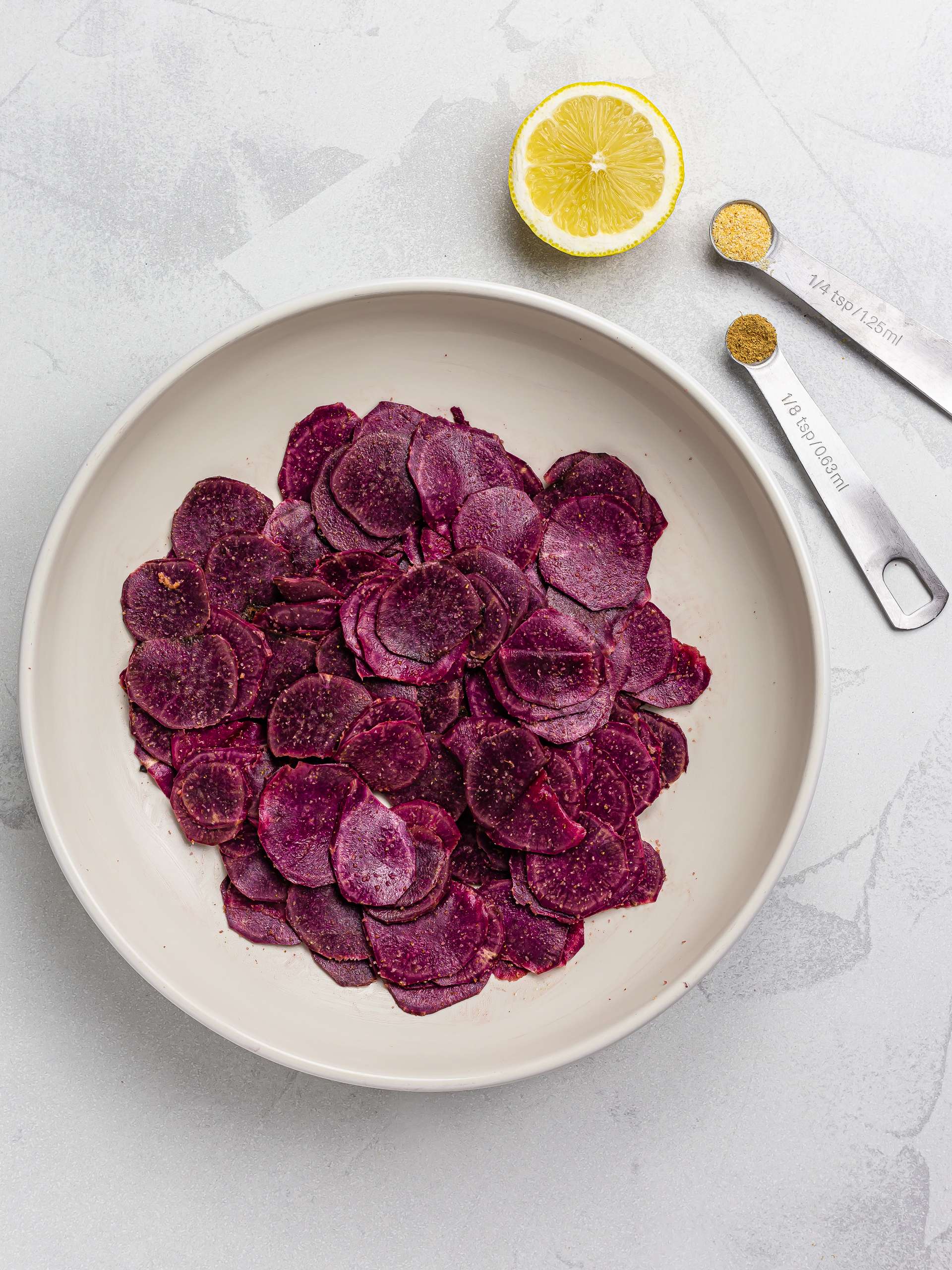 purple sweet potatoes chips seasoned with oil and spices