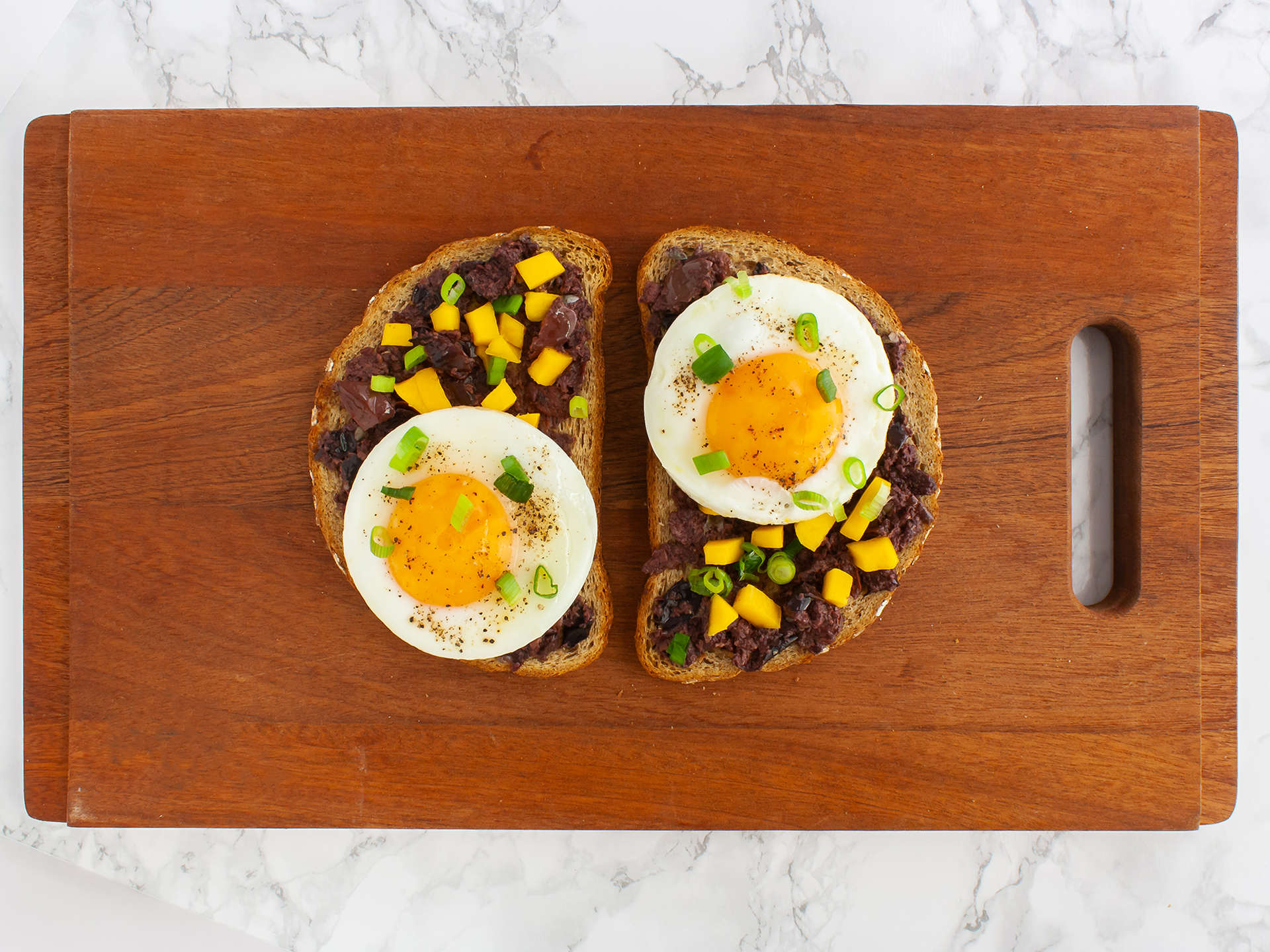 Step 3.2 of Olive Tapenade Bruschetta With Mango and Eggs