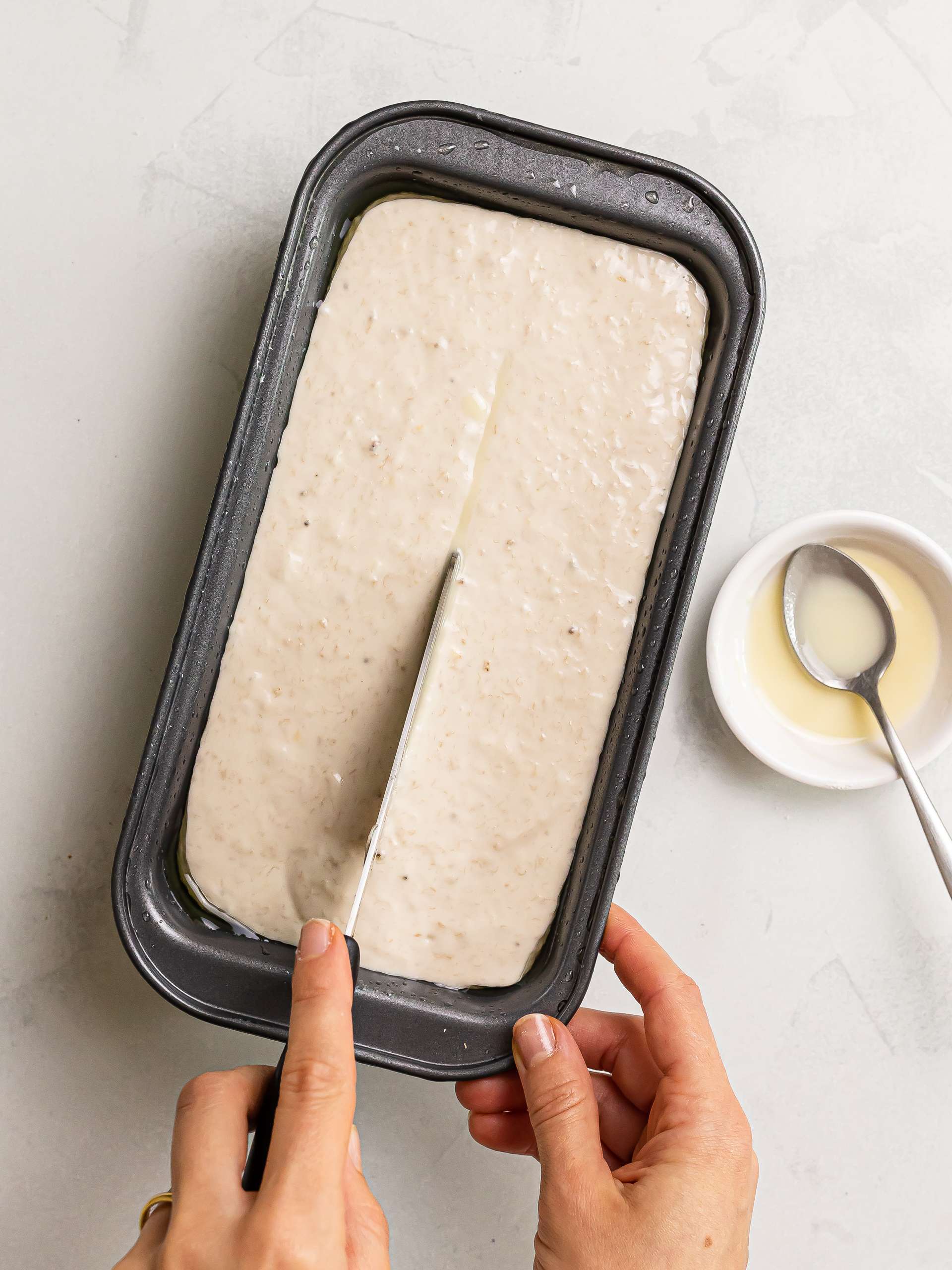 mochi flour banana bread cake batter in a loaf tin