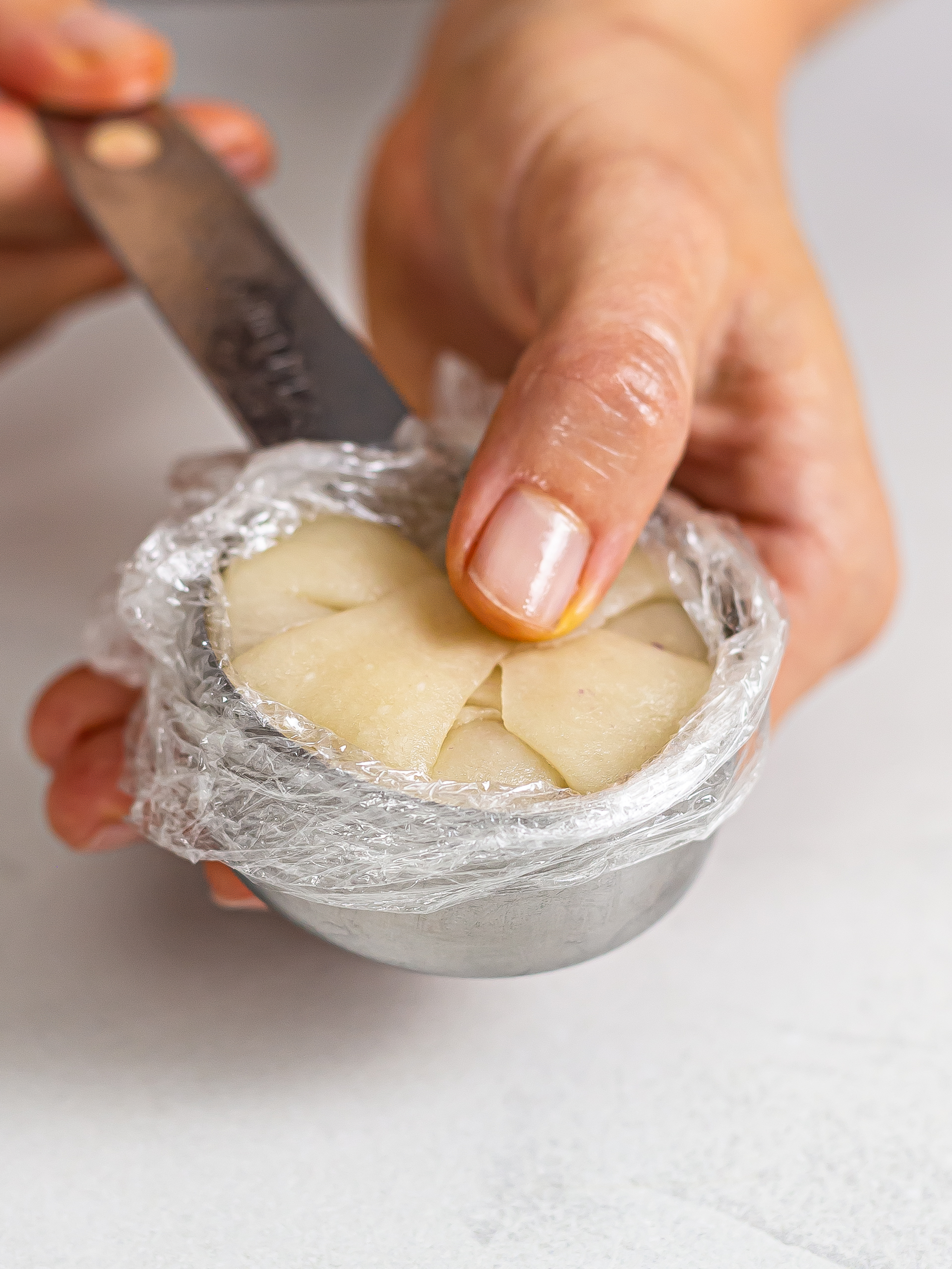 hopia cake pressed in a cup to give it dome shape