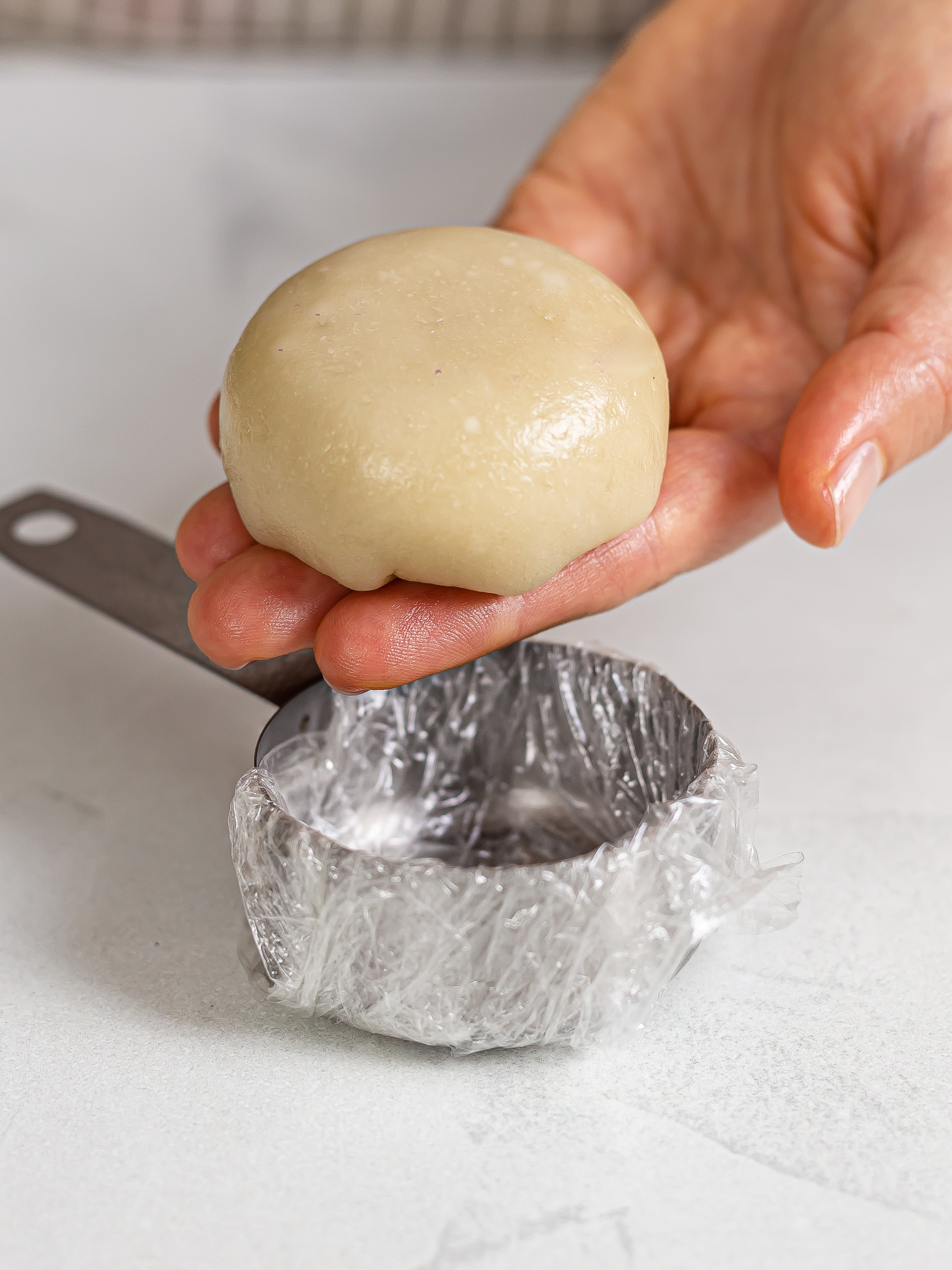 hand showing the shaped hopia cake