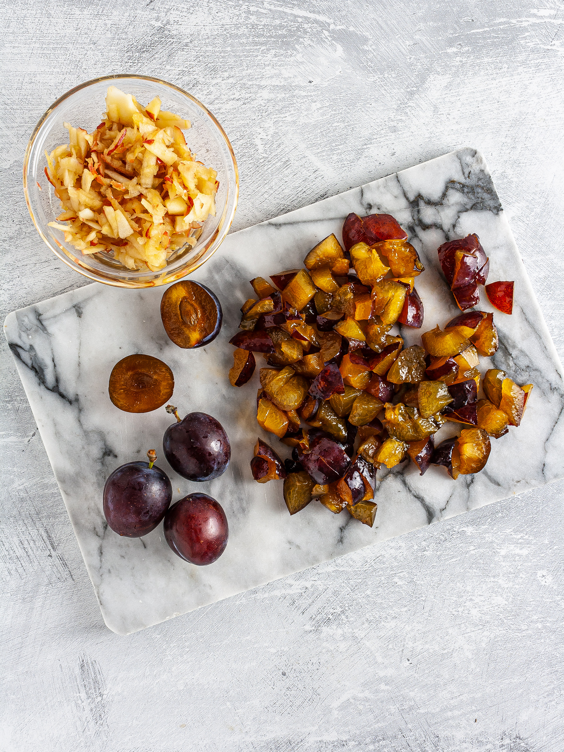 Chopped plums and grated apple