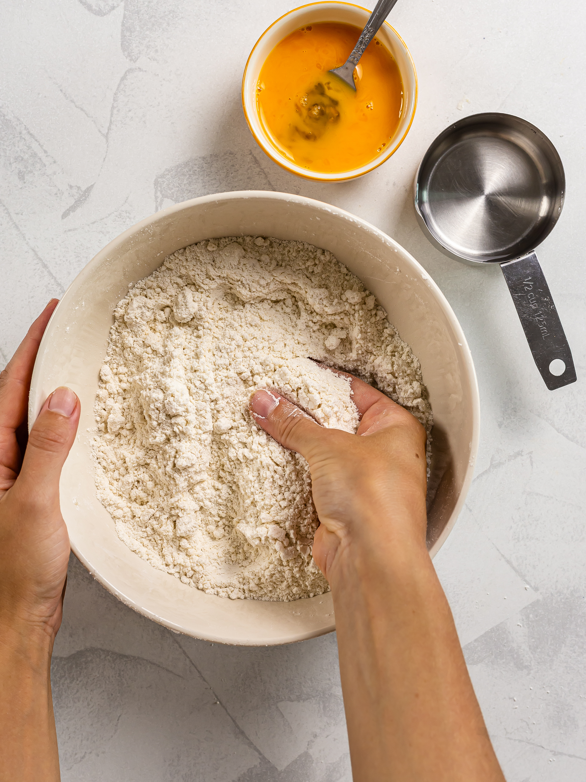 thai banana pancake dough ingredients in a bowl