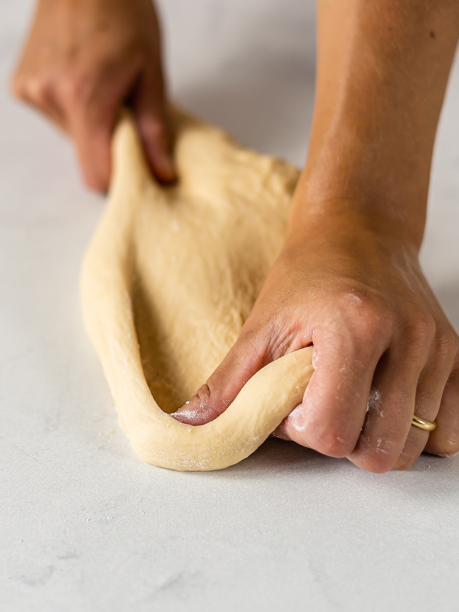 woman kneading thai banana pancake dough