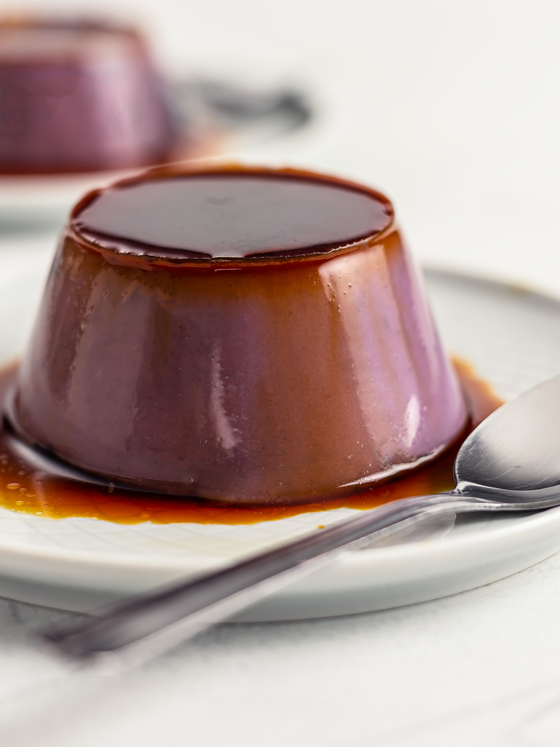 ube leche flan flipped on a plate