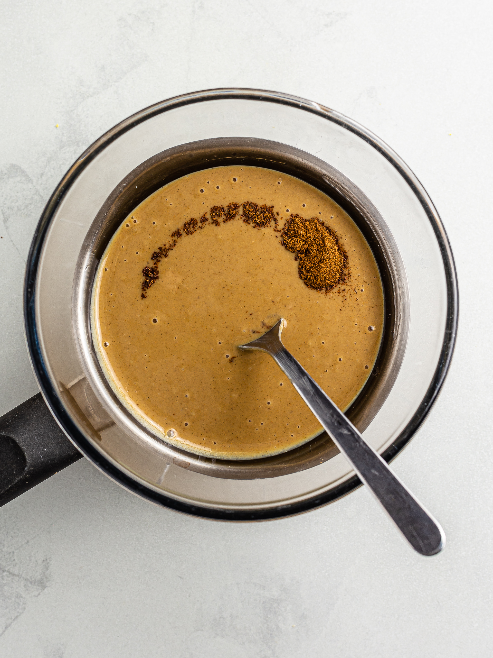 warm tahini on a double boiler