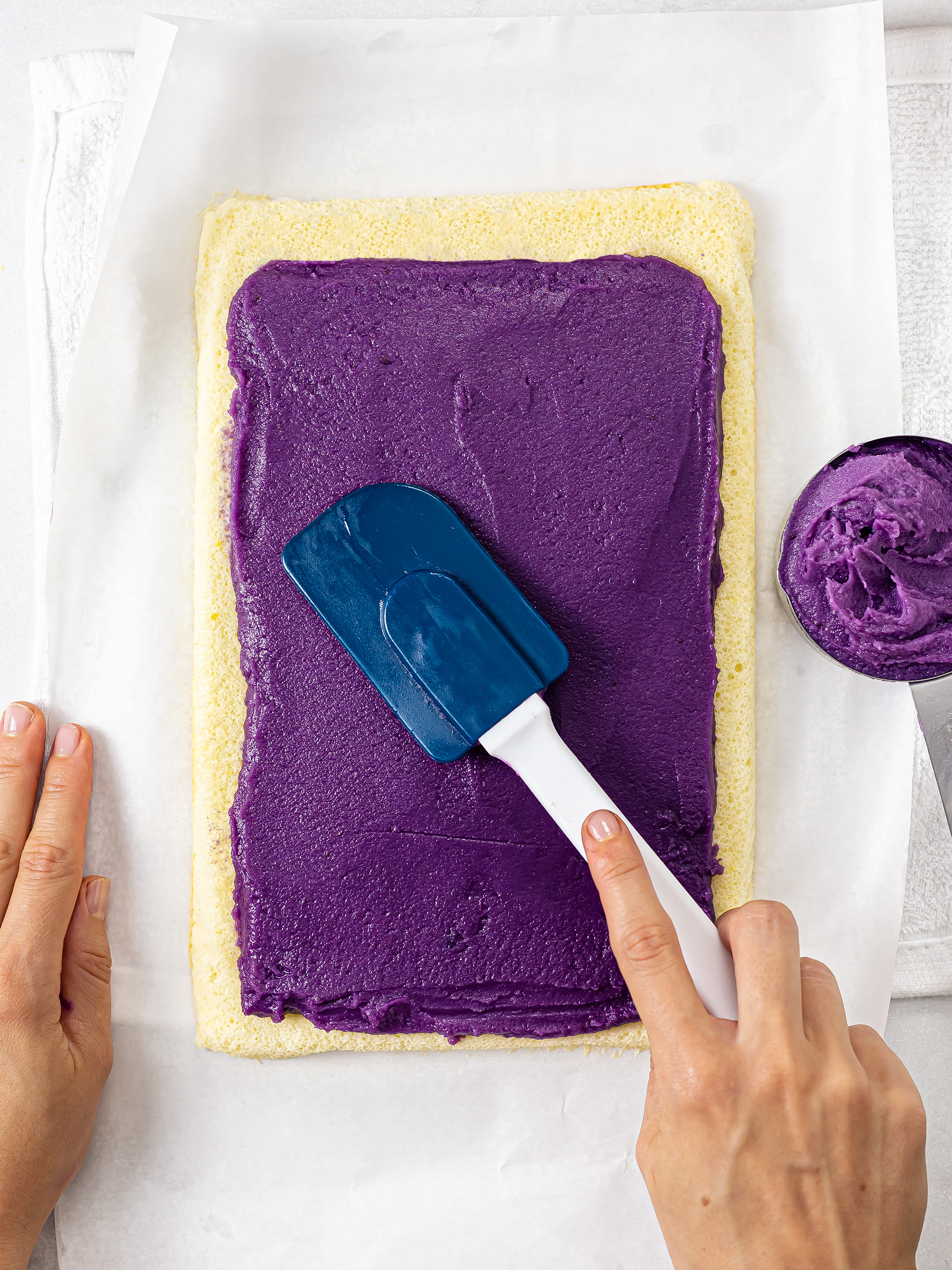 sponge cake base spread with ube butter cream