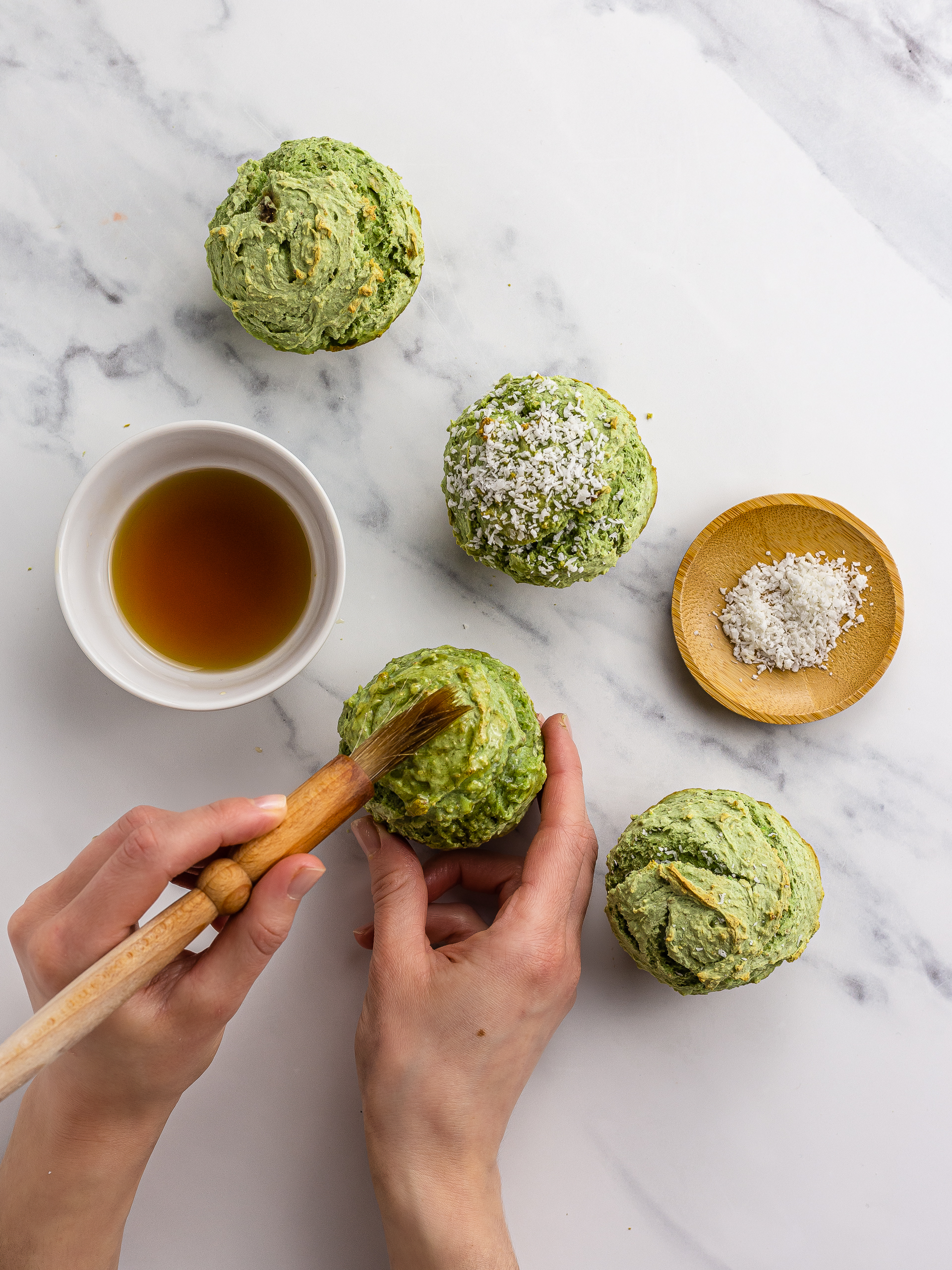 pandan muffins with maple and coconut flakes