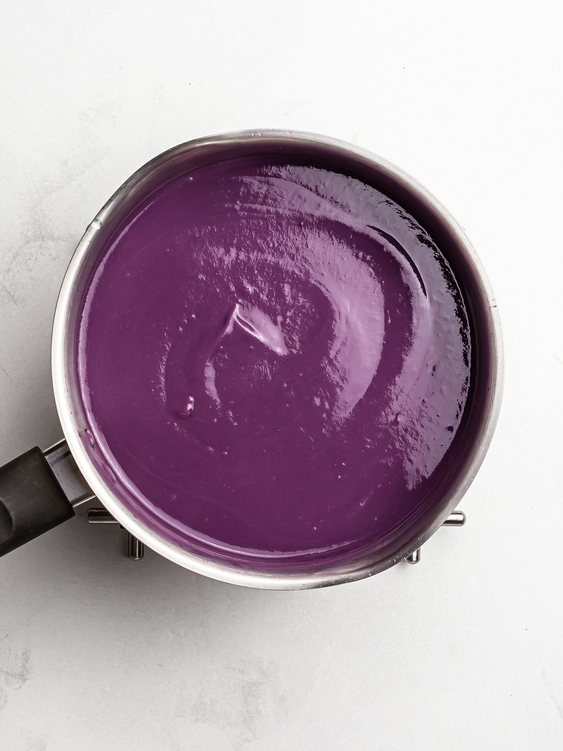 blended purple yam soup velouté in a pot