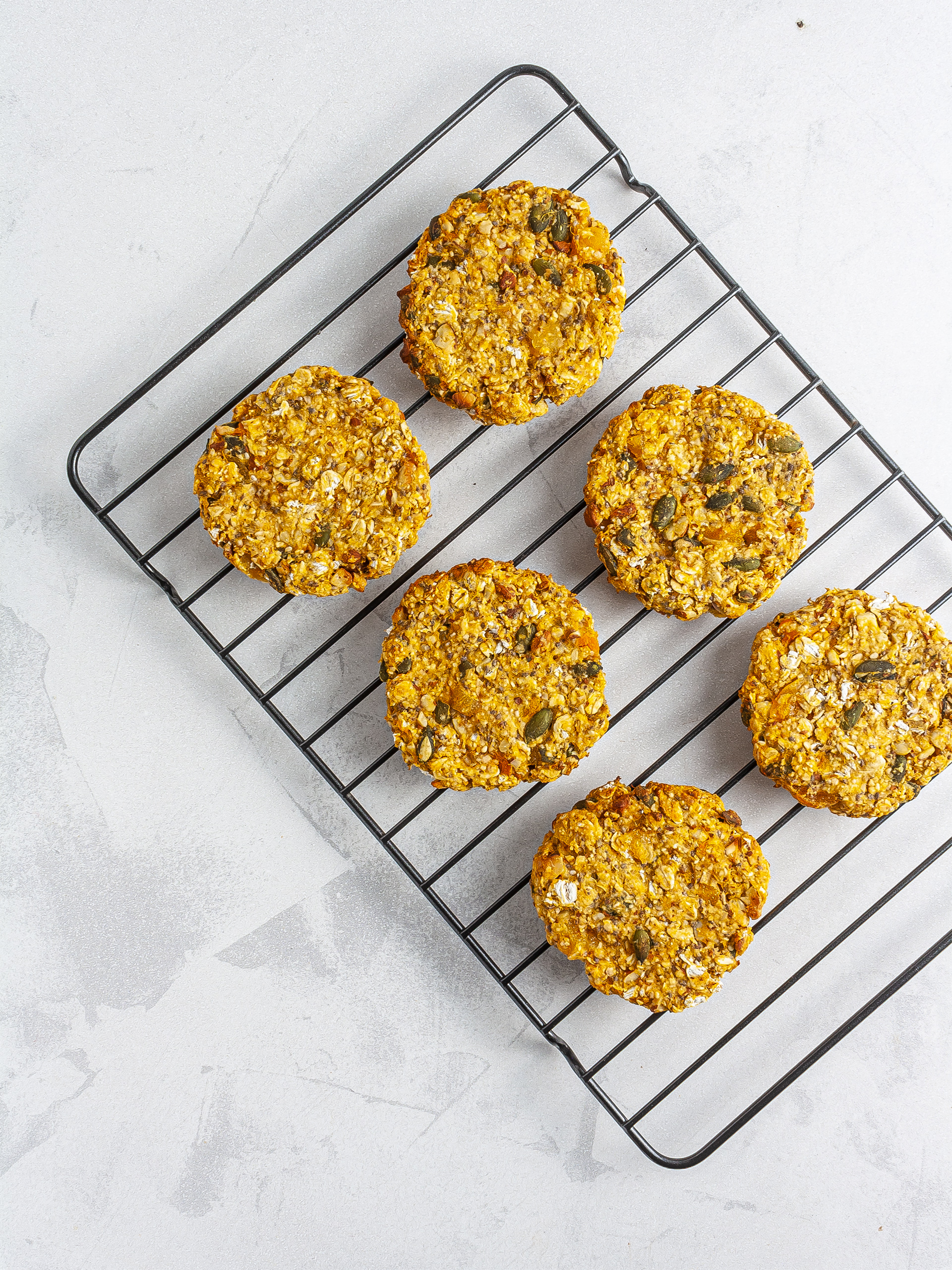 Baked sweet potato cookies on a cooling rack