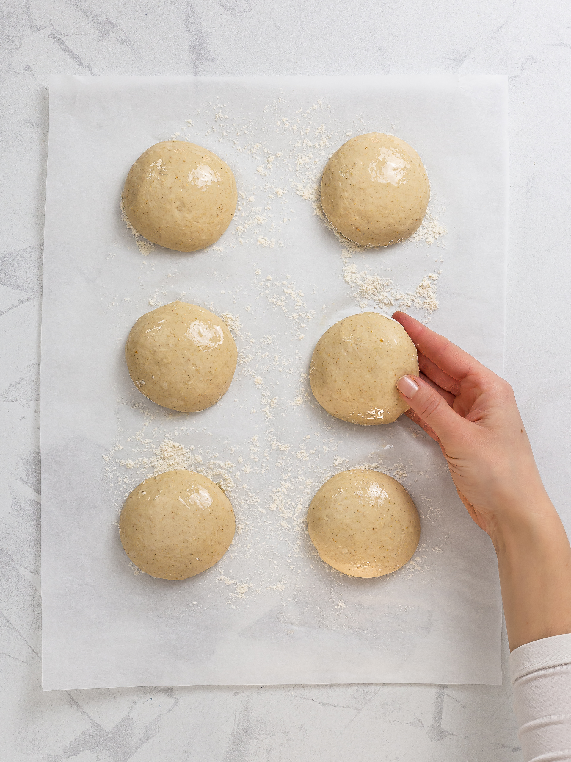 sourdough naan dough divided into balls