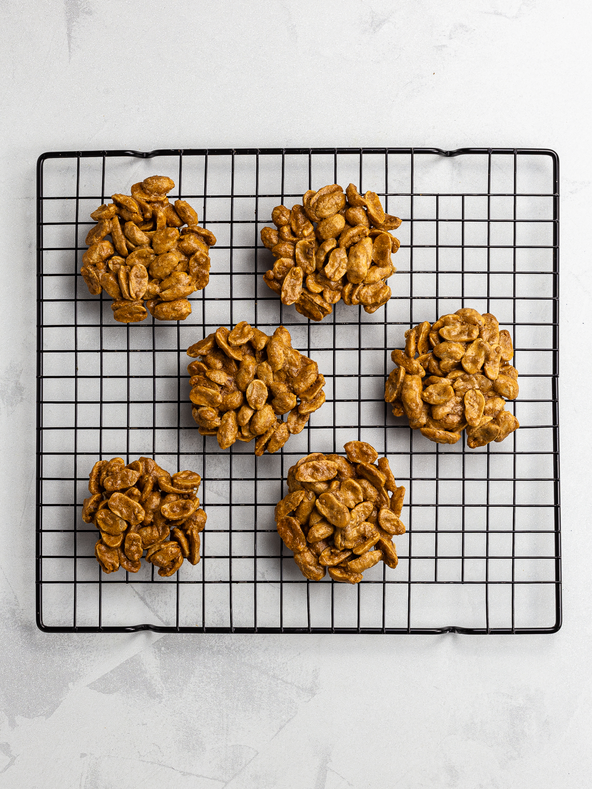 baked jamaican peanut drops on a rack