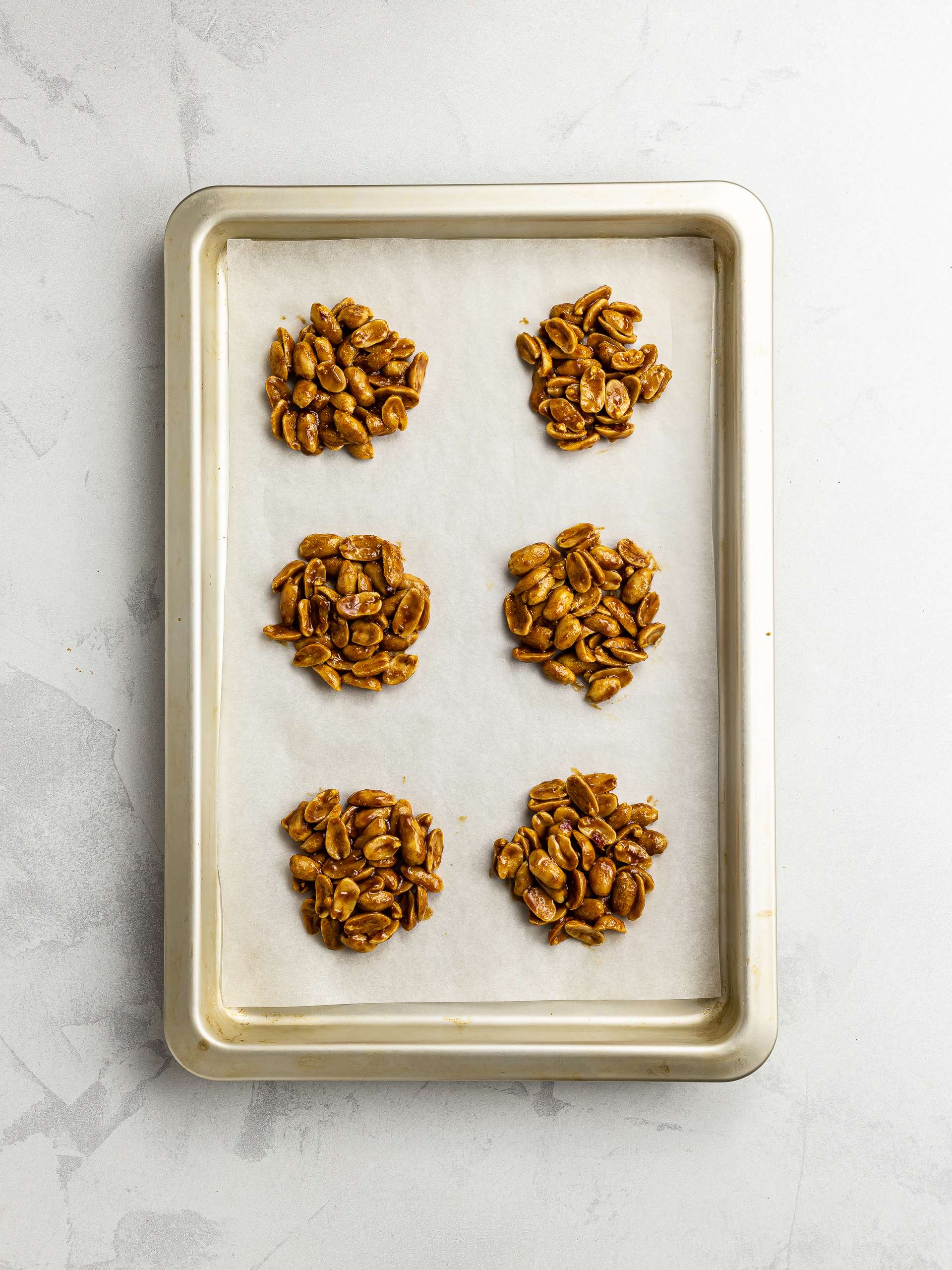 peanut drops on a baking tray
