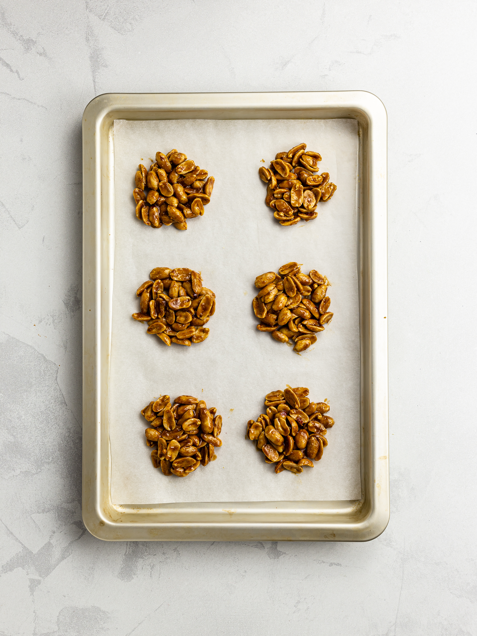 peanut drops on a baking tray