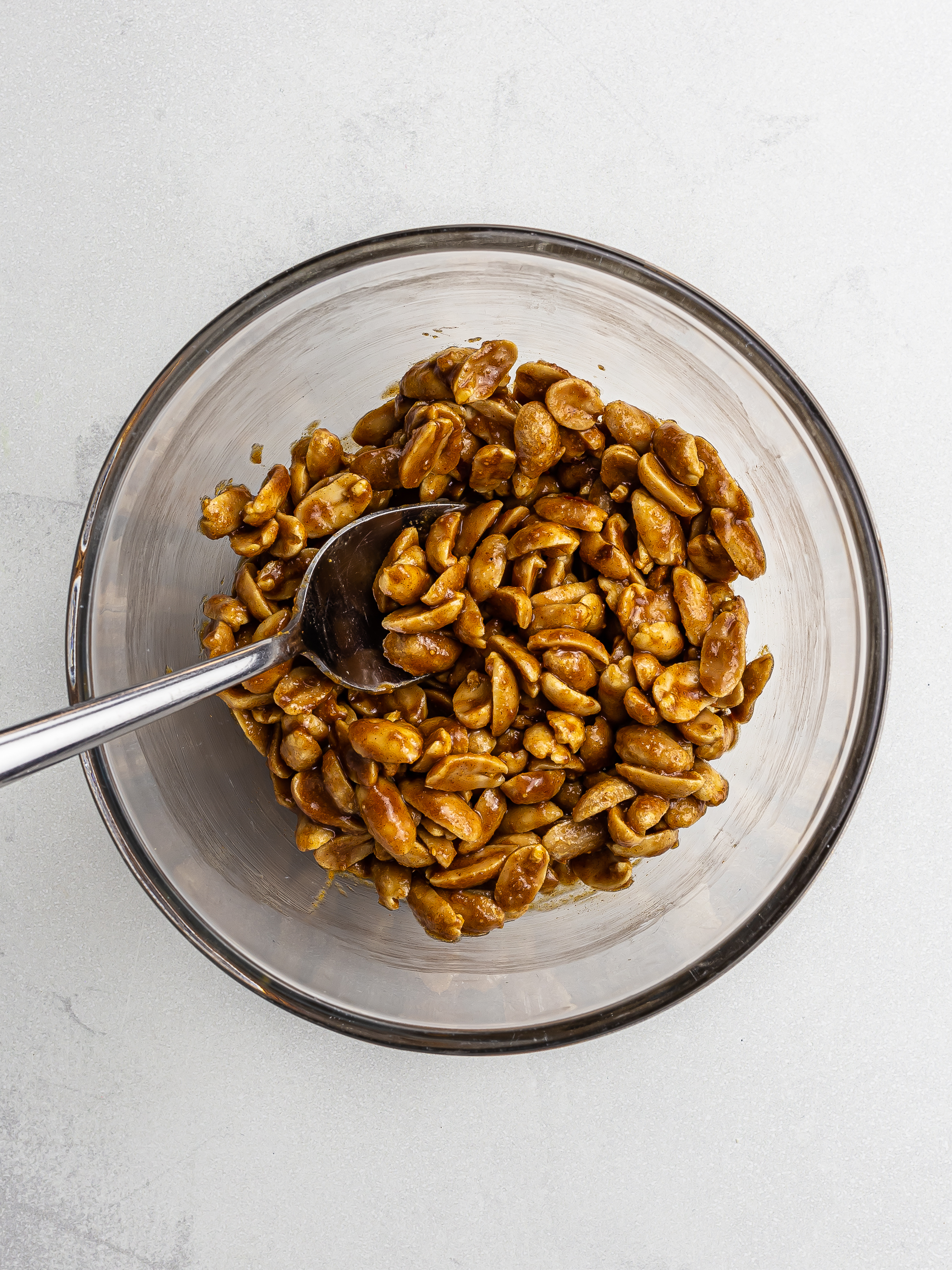 peanuts coated with maple syrup and peanut butter