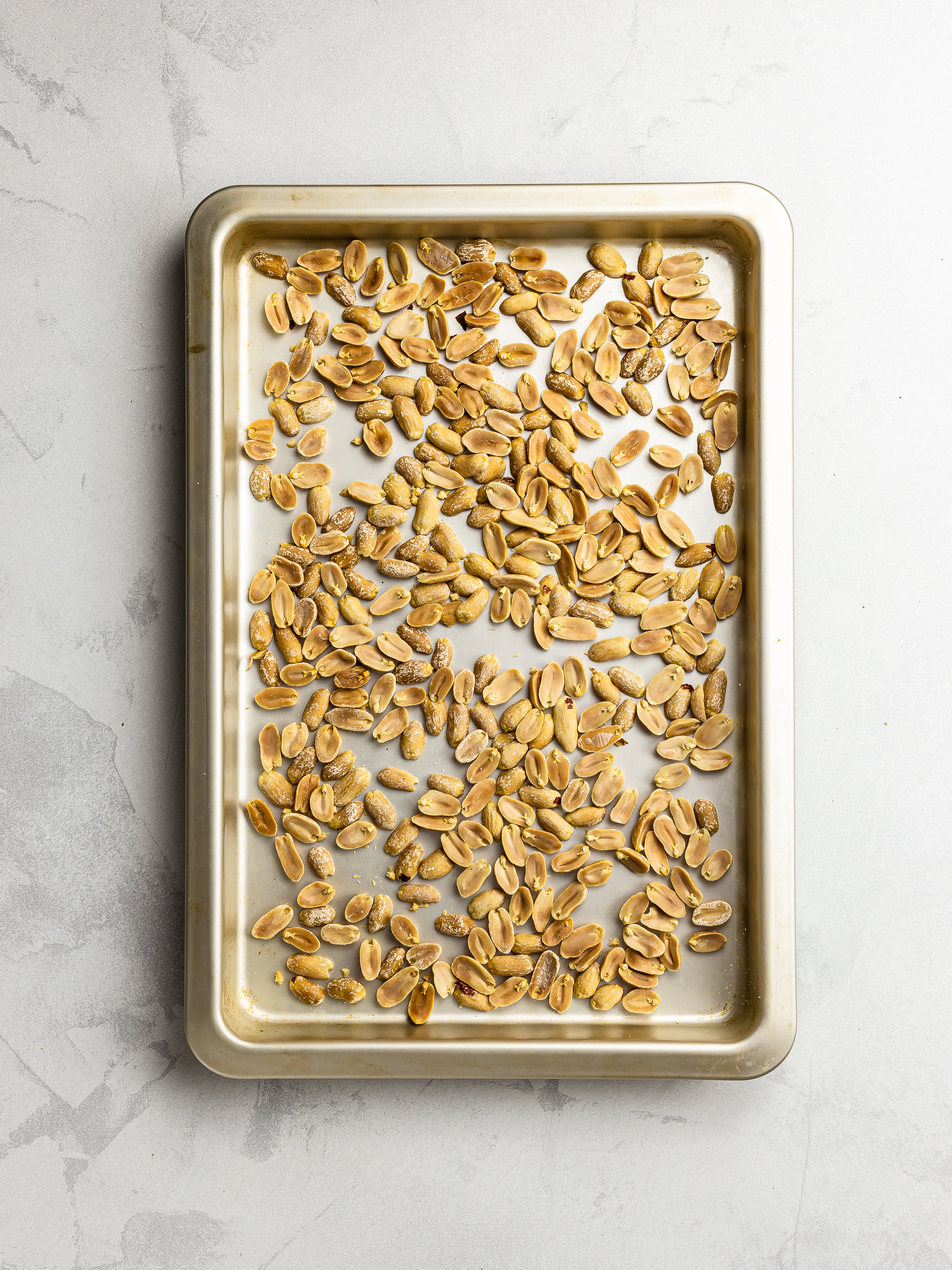 roasted peanuts on a tray