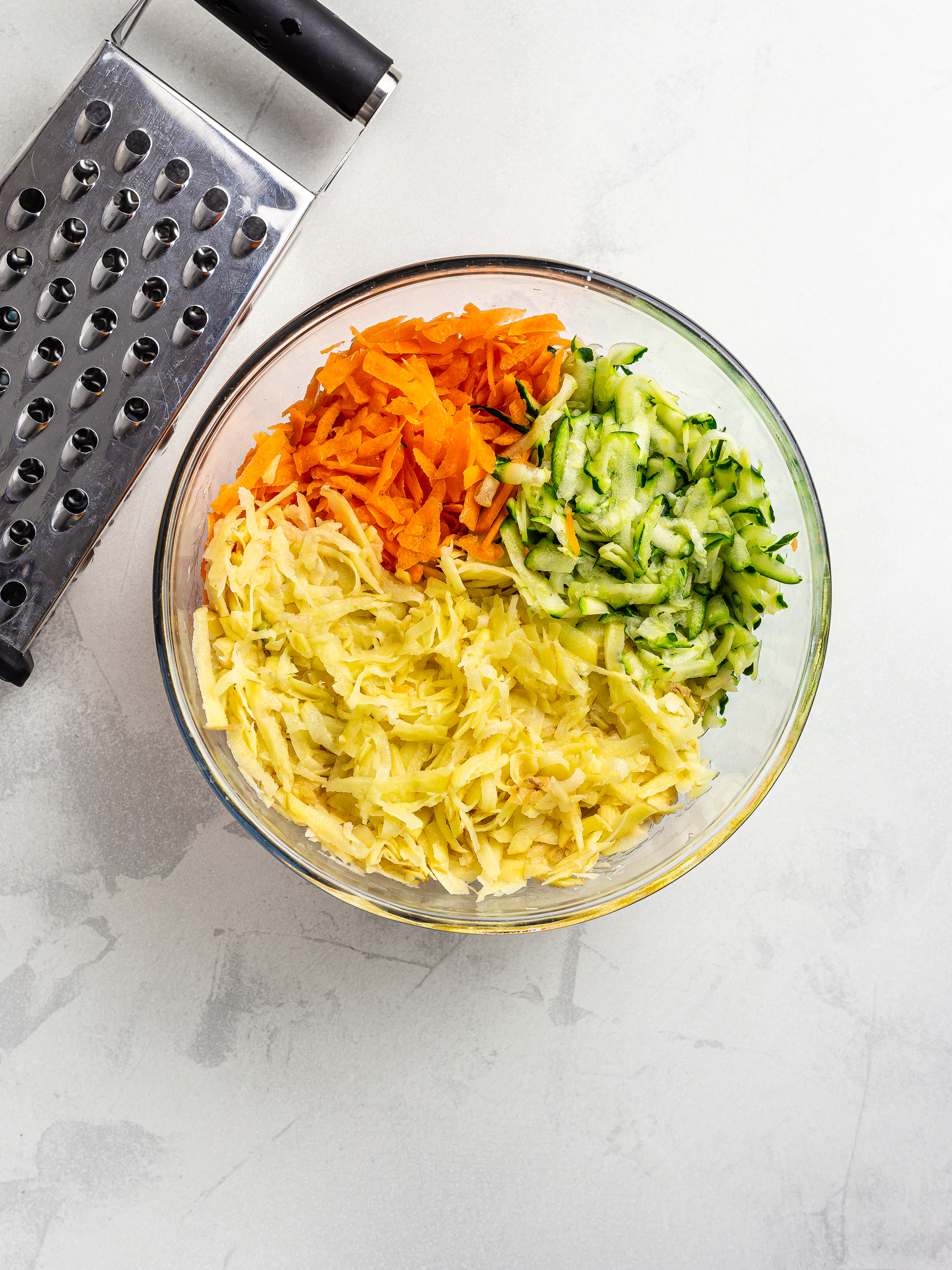 grated carrots potatoes and zucchini