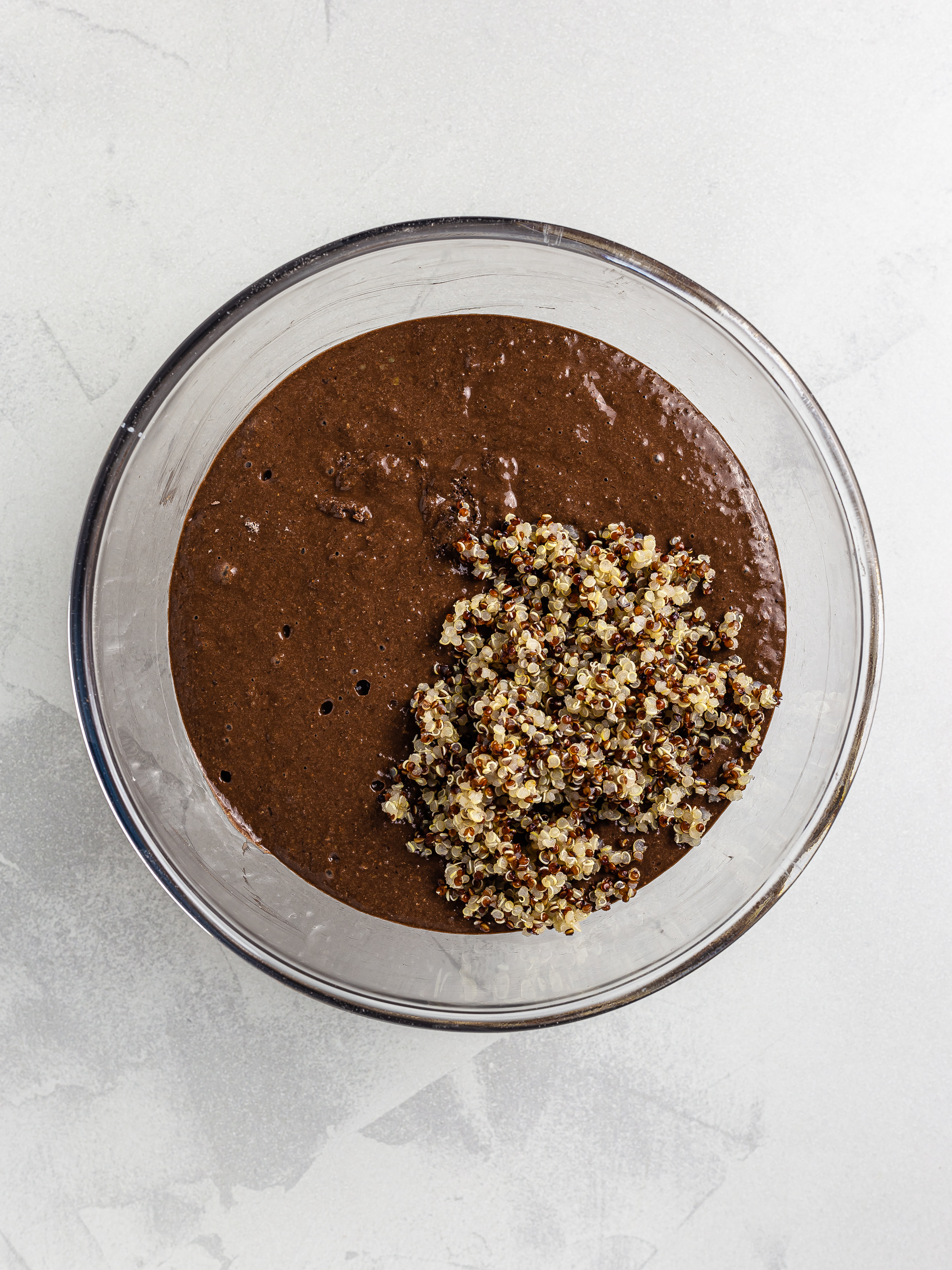 chocolate muffin batter with cooked quinoa