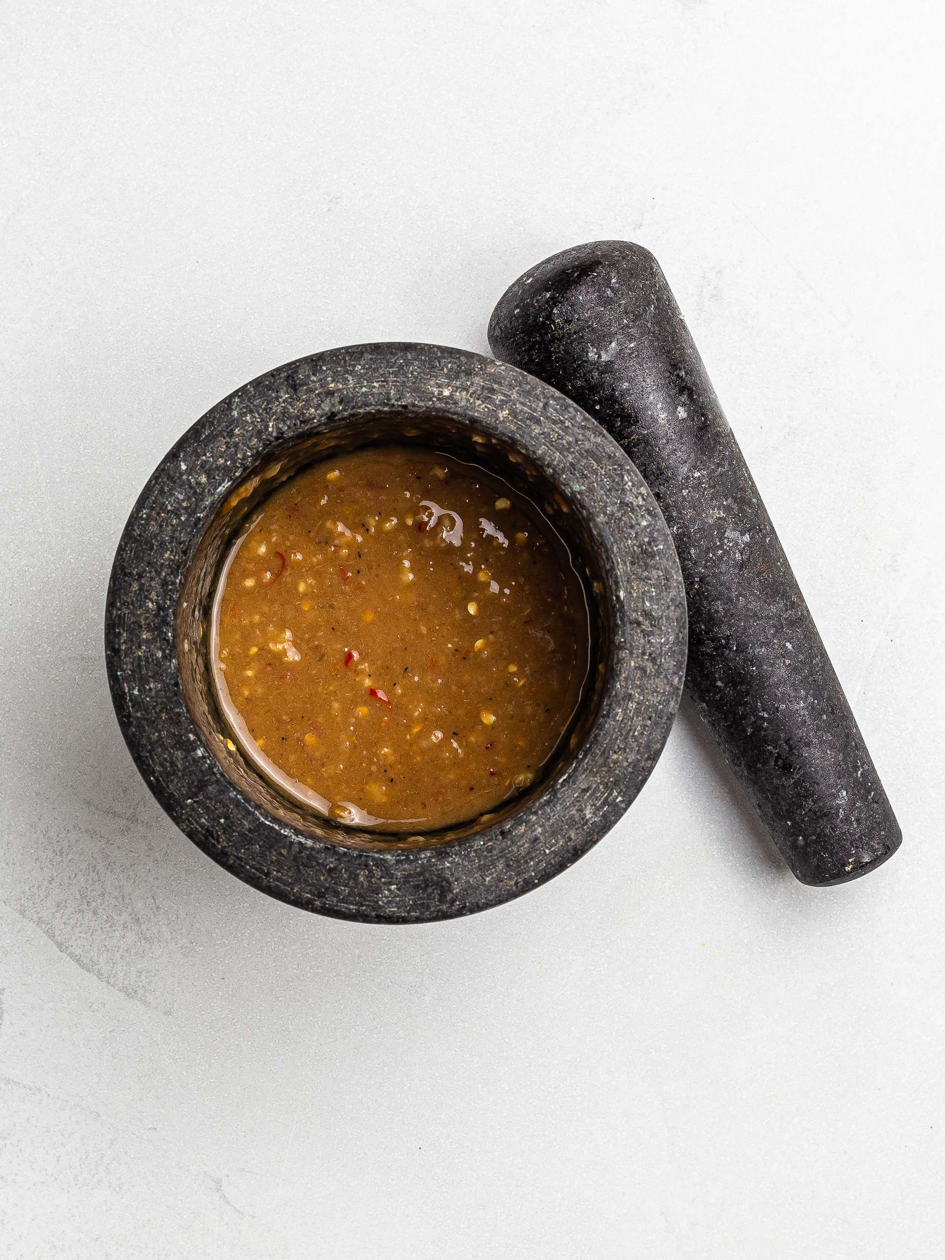 lao papaya salad sauce in a mortar