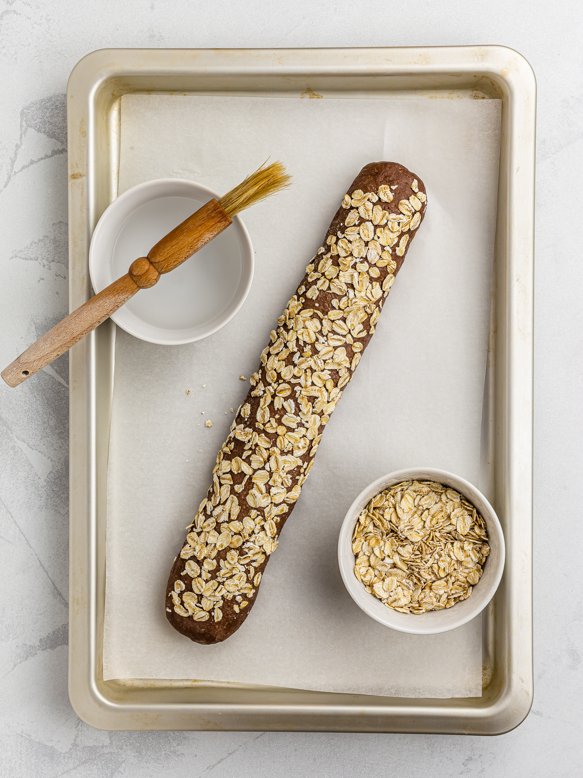 brown bread baguette with oat flakes