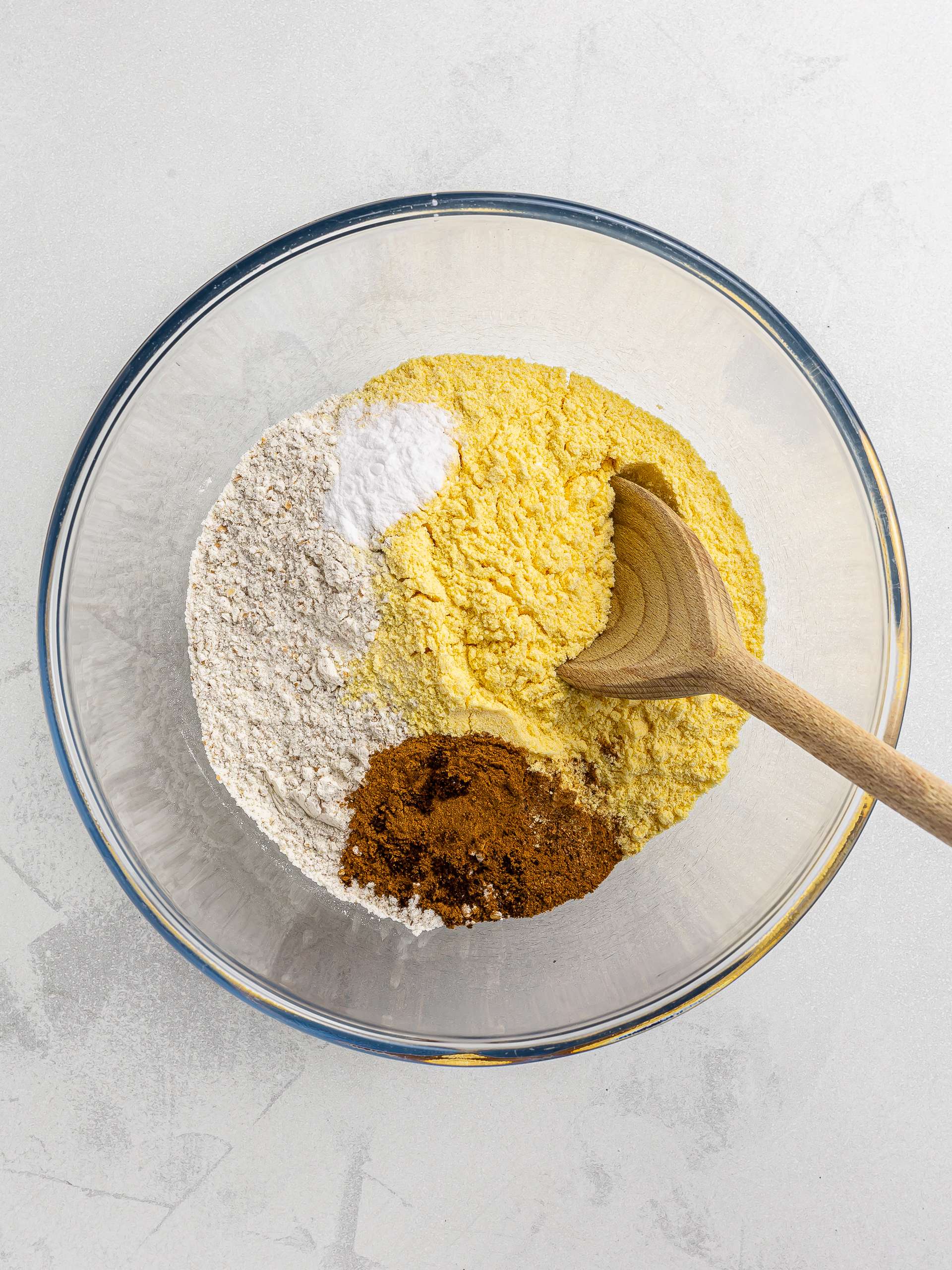 flour spices and cornmeal in a bowl