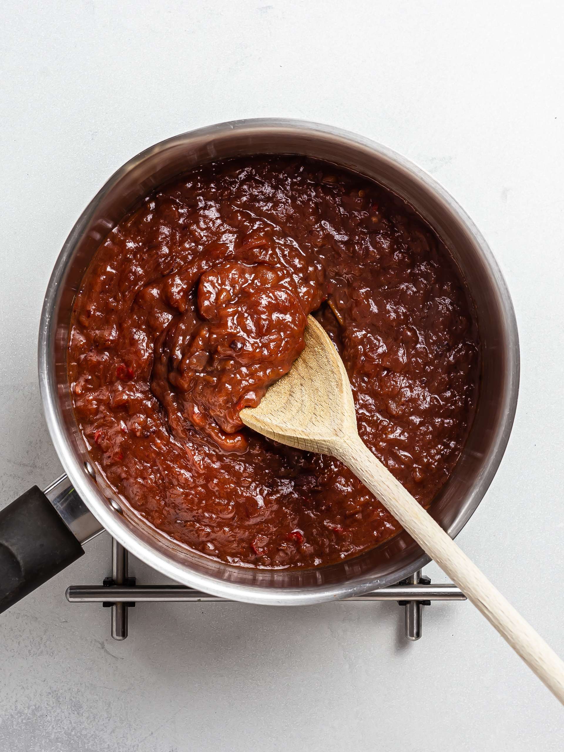 plum chutney cooking in a pot