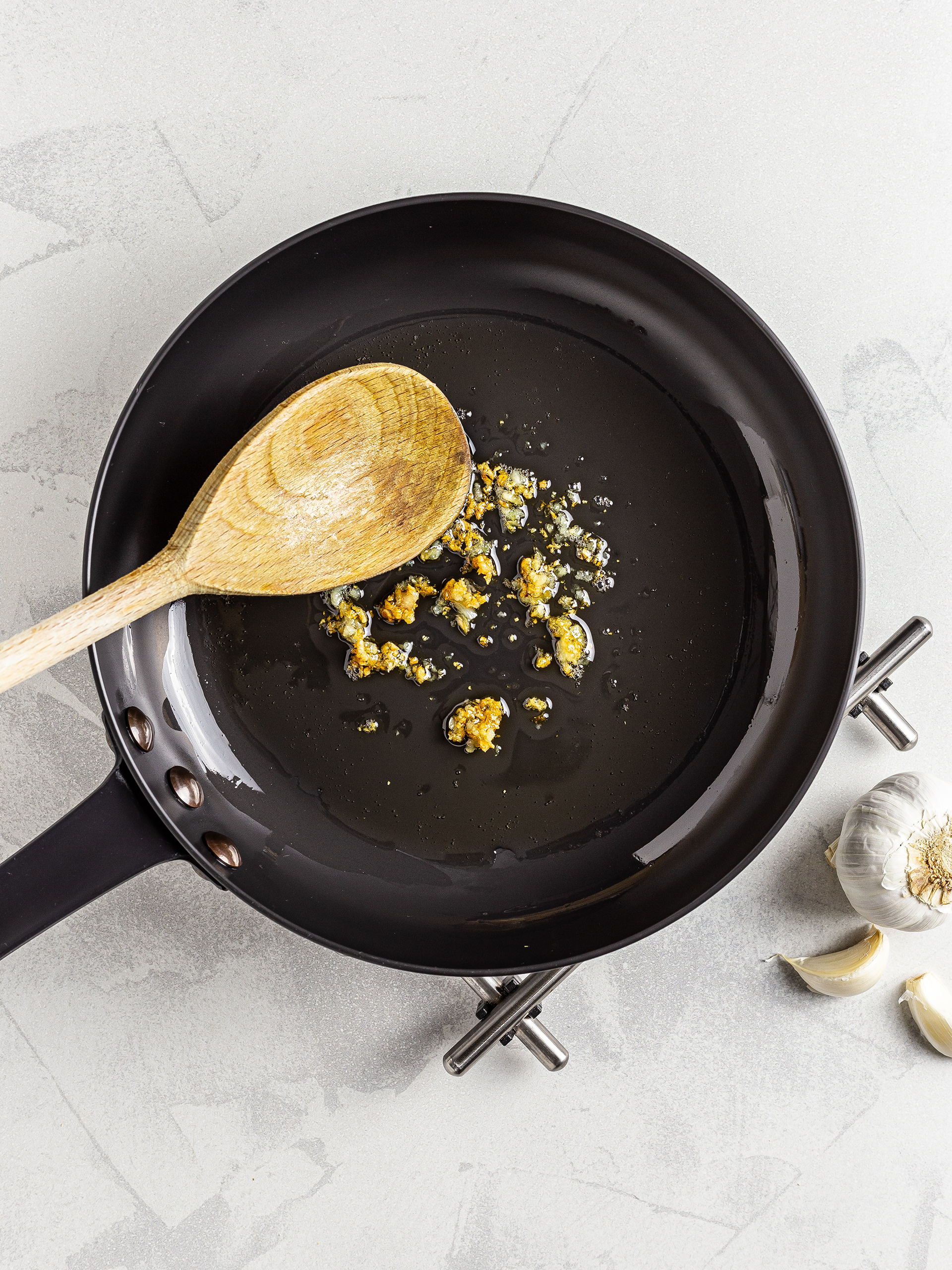 Fried garlic in a skillet