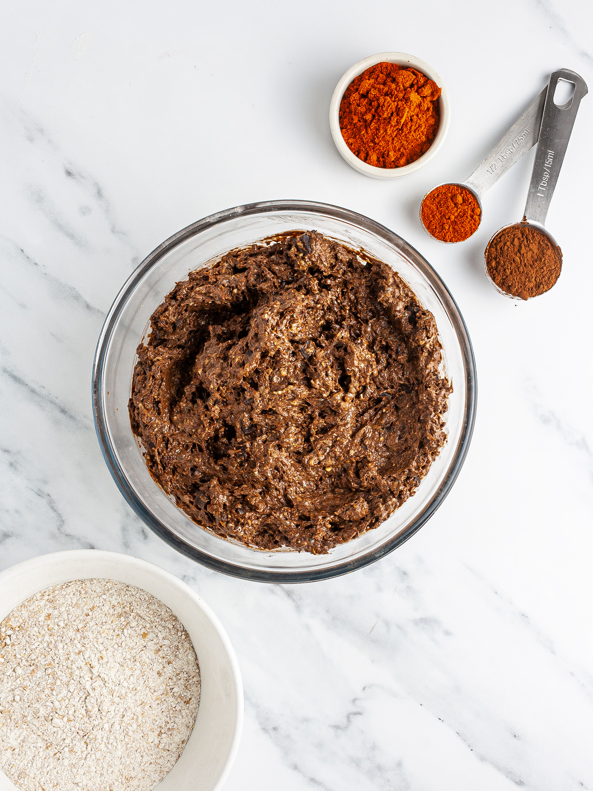 Muffin batter with cocoa, wholemeal flour, and chilli powder.