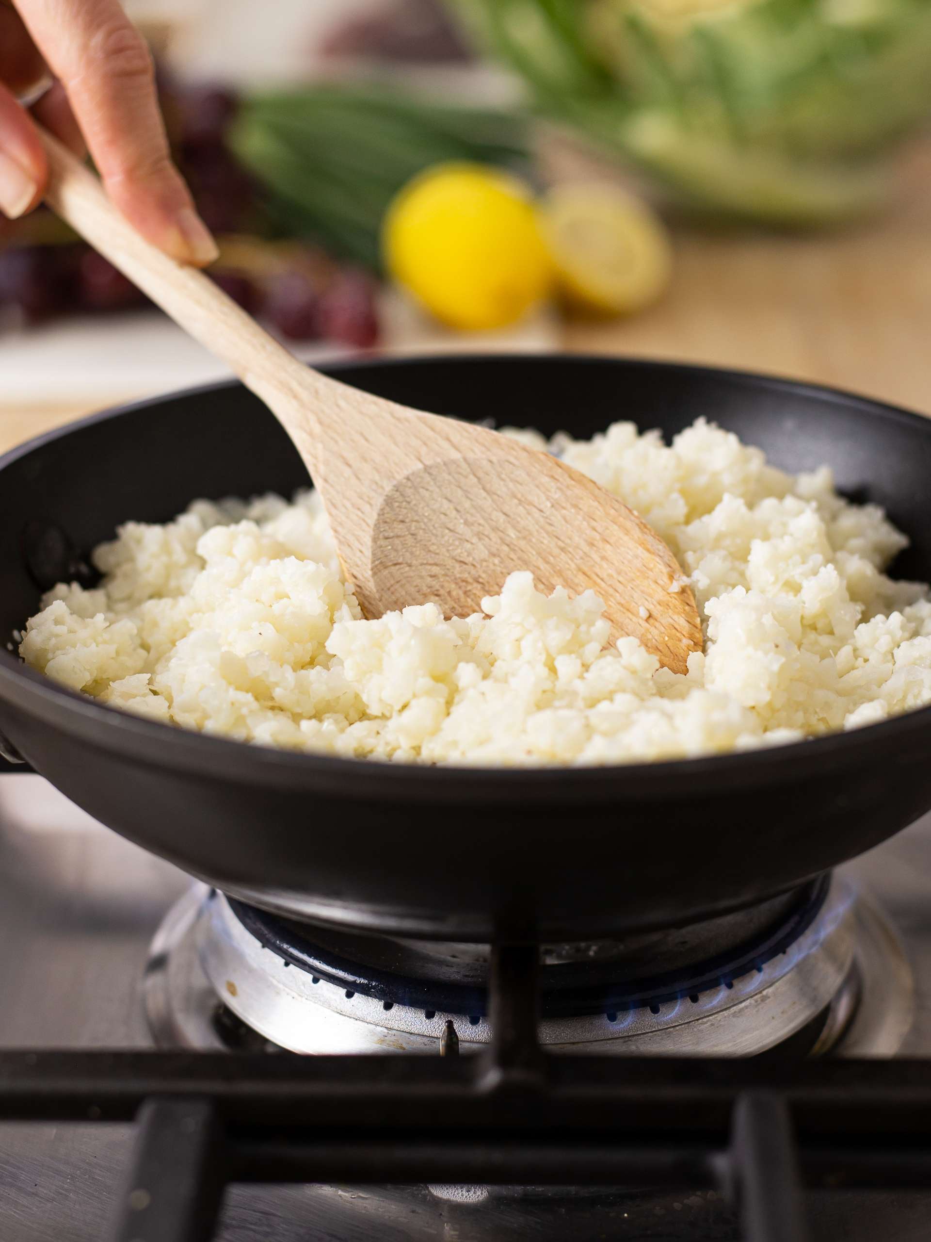 cauliflower rice cooked in a pan
