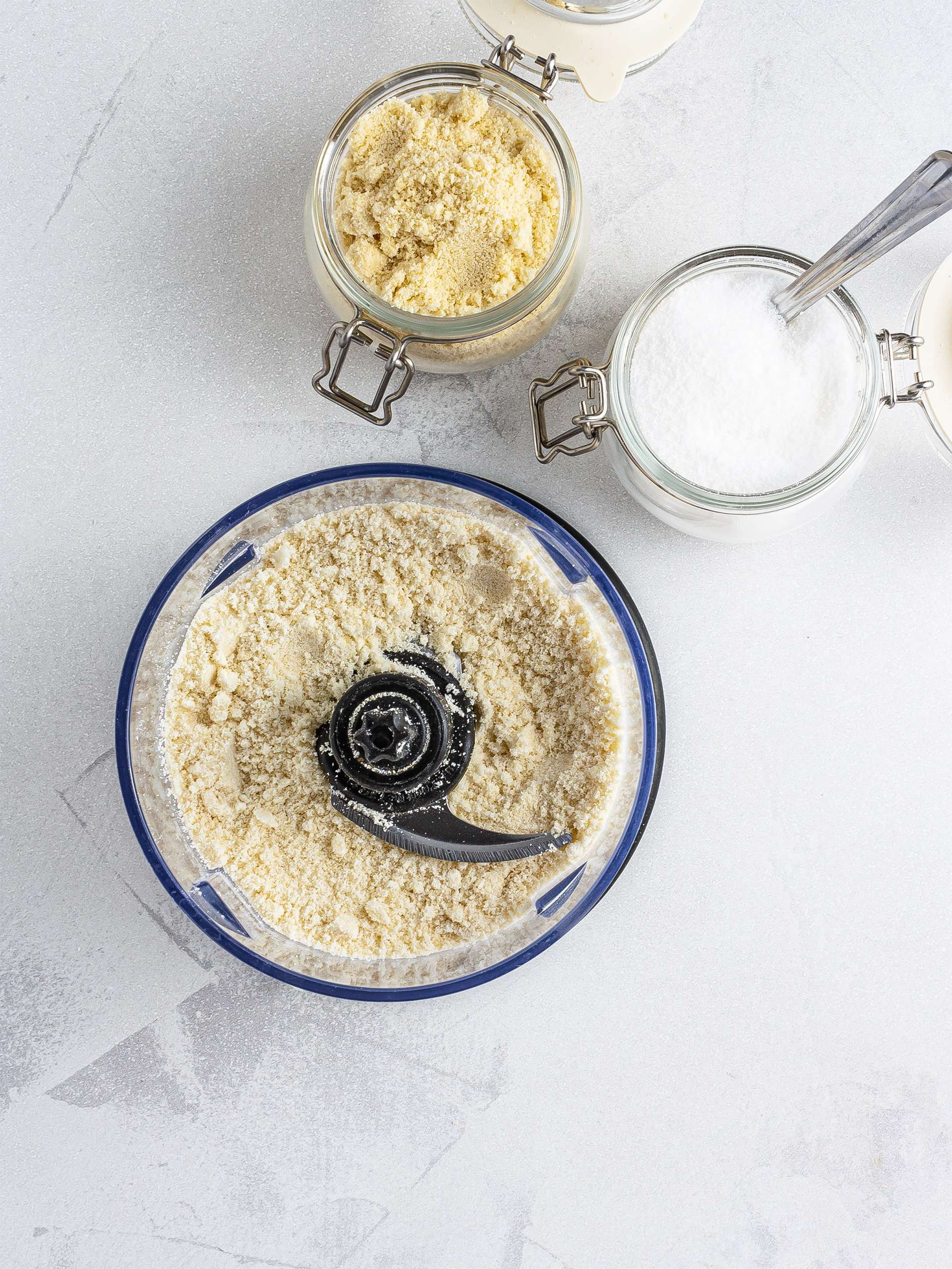 Almond flour and erythritol in a food processor