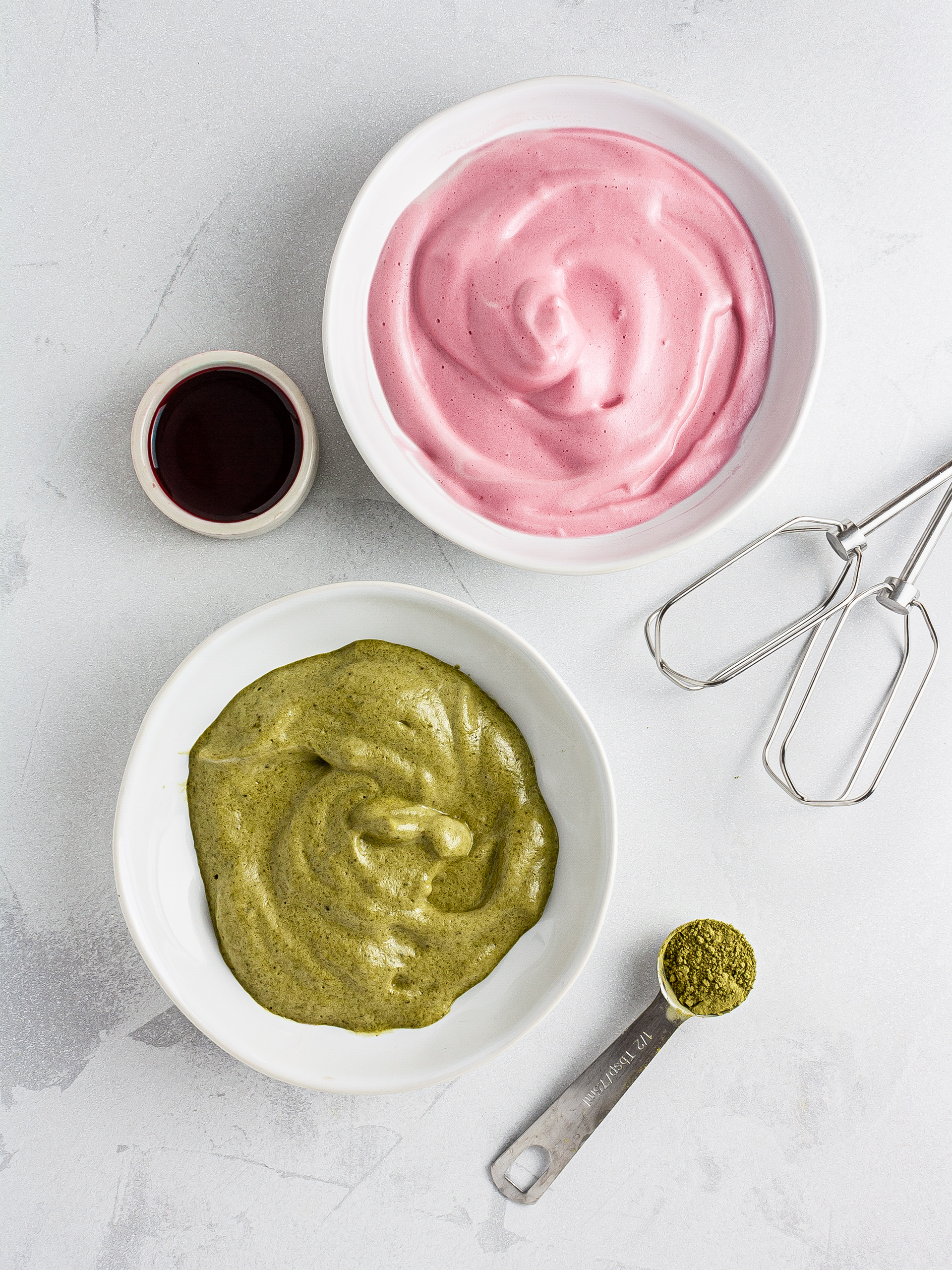 Aquafaba whipped and mixed with matcha and beetroot juice