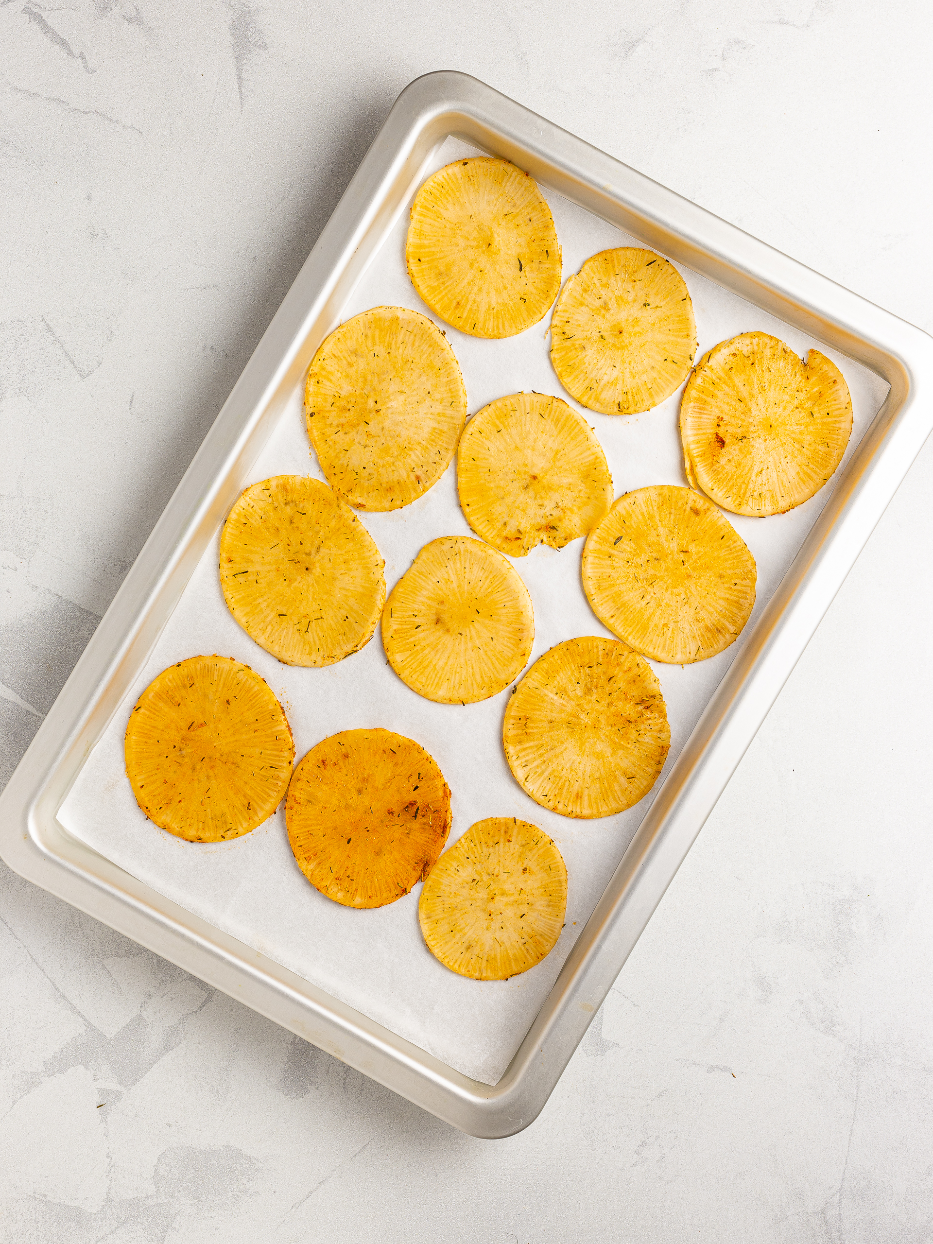 daikon chips on a baking tray