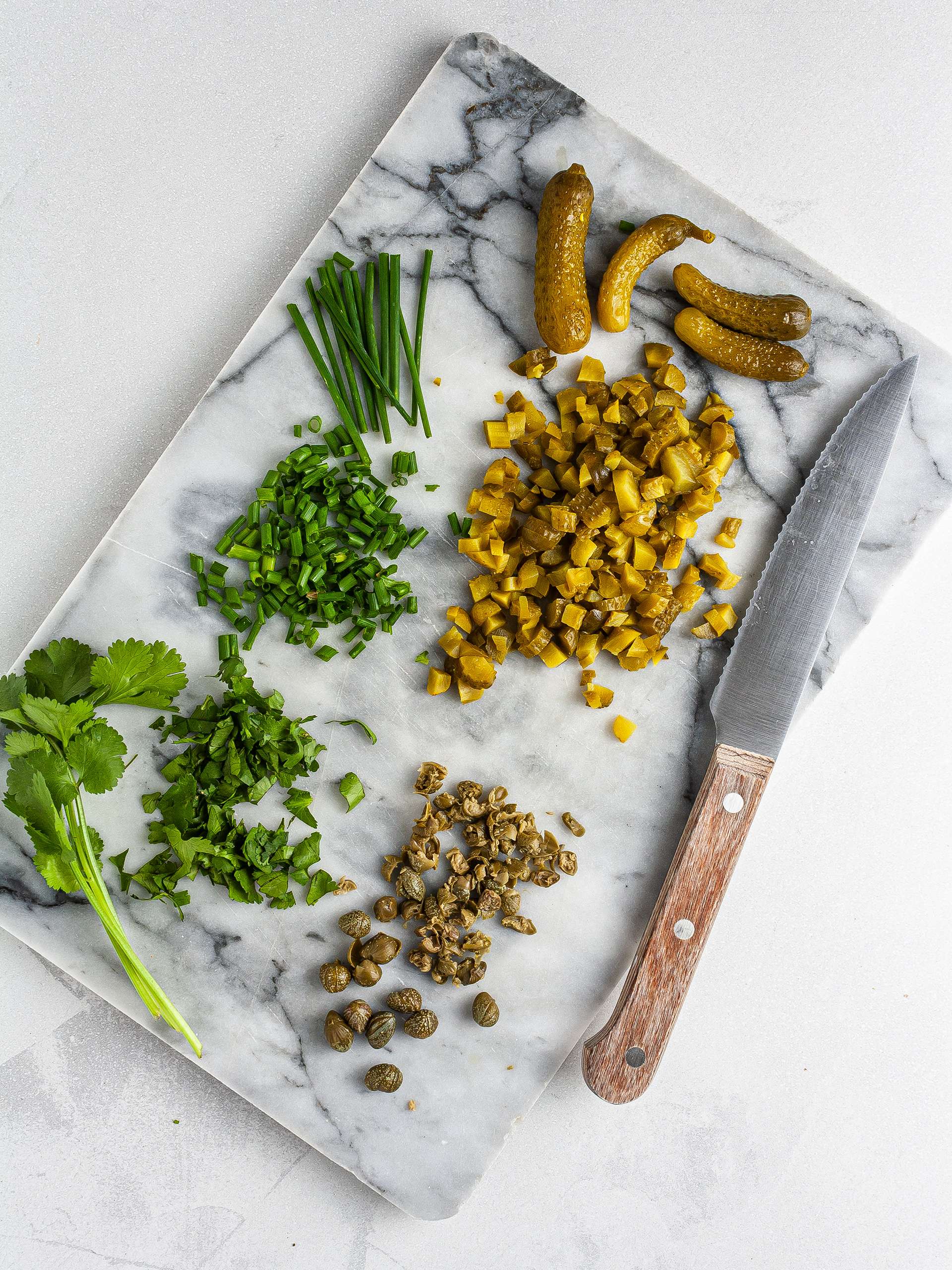 Chopped capers, gherkins and herbs