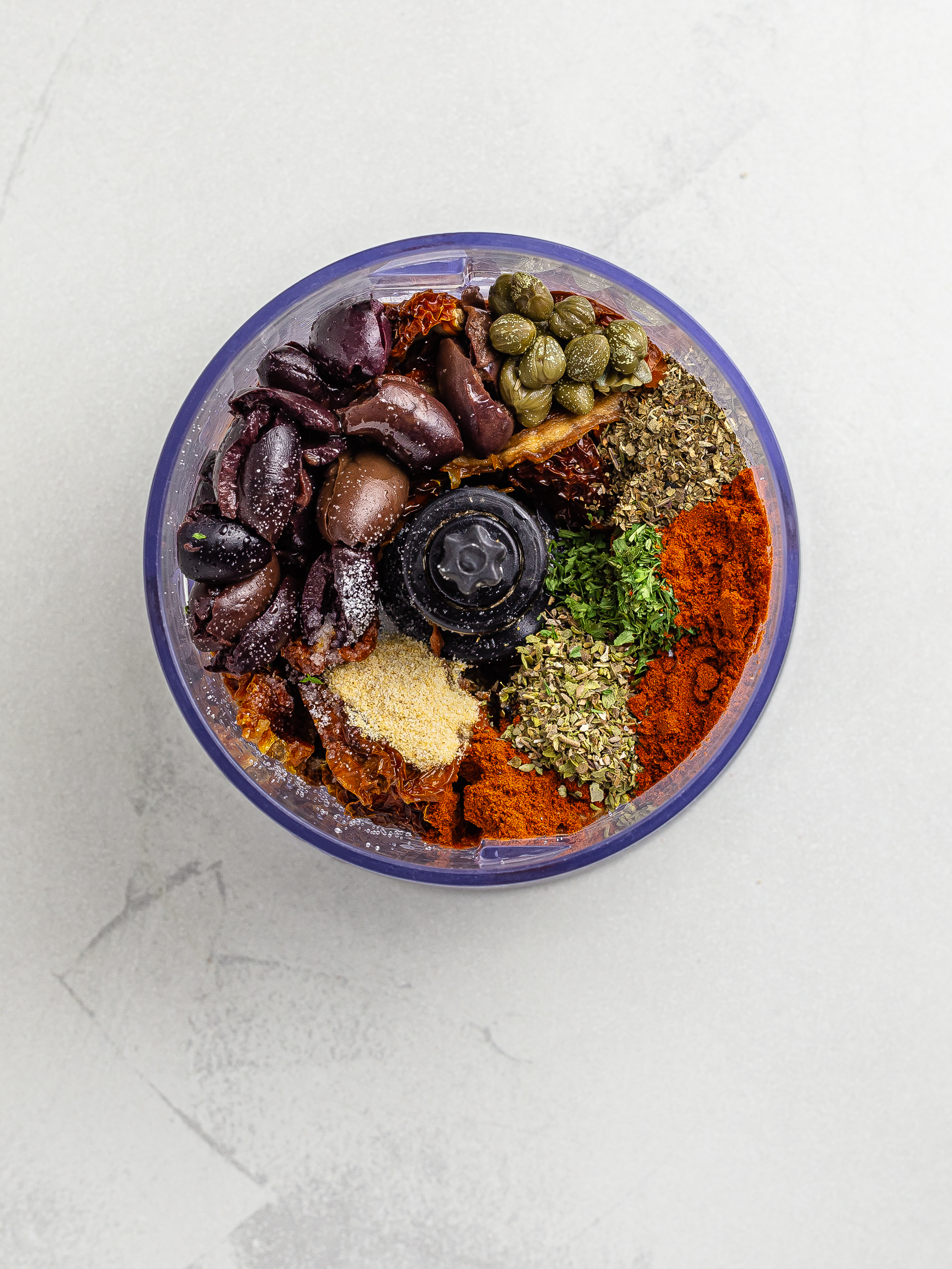 sundried tomato pate ingredients in a blender