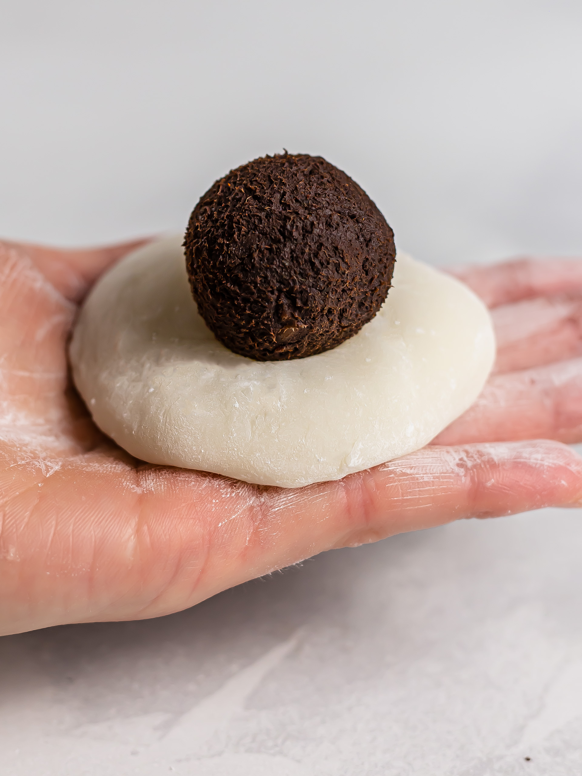 mochi dough wrapper with chocolate filling ball