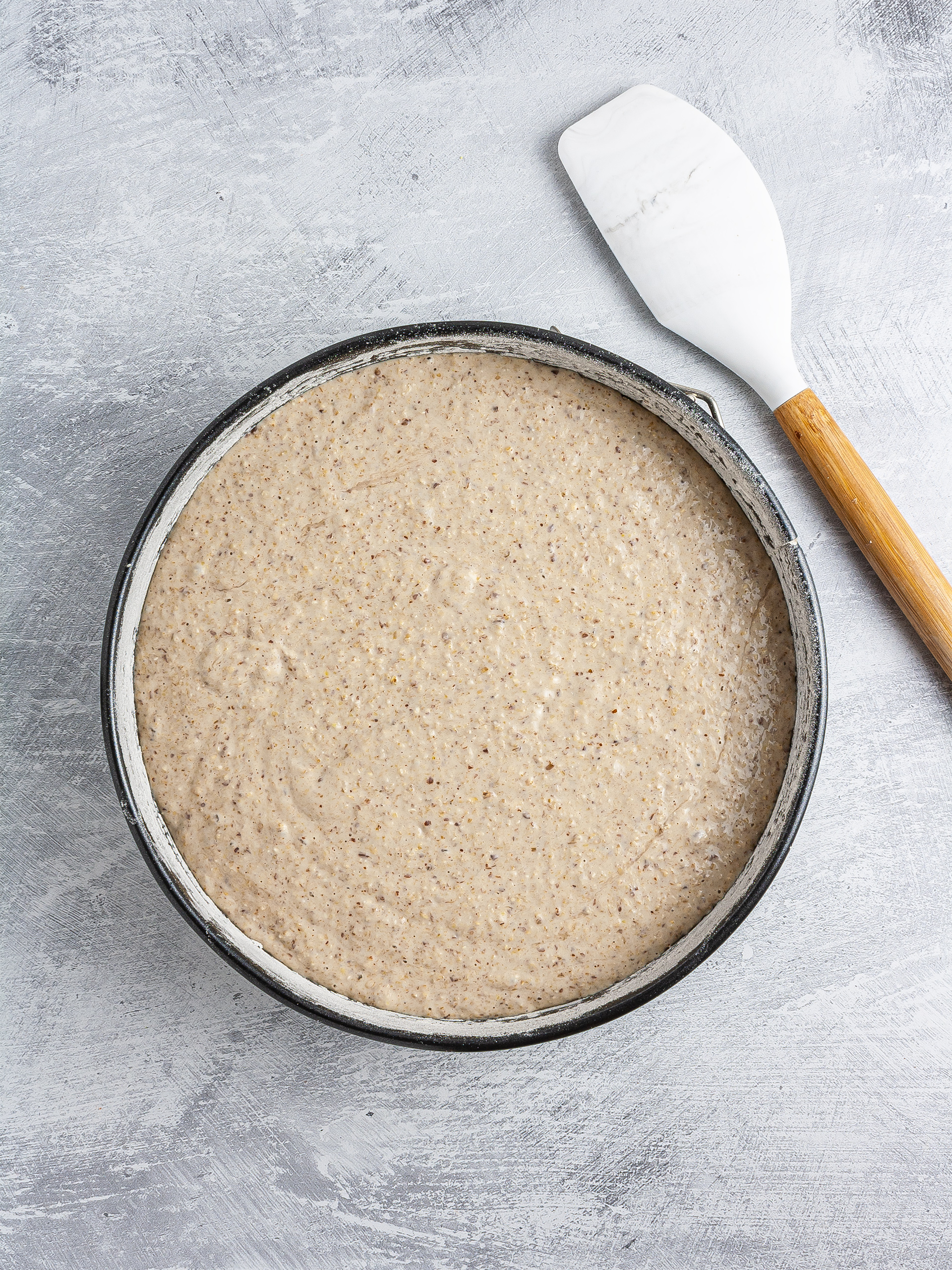 Lemon cake batter in cake tin