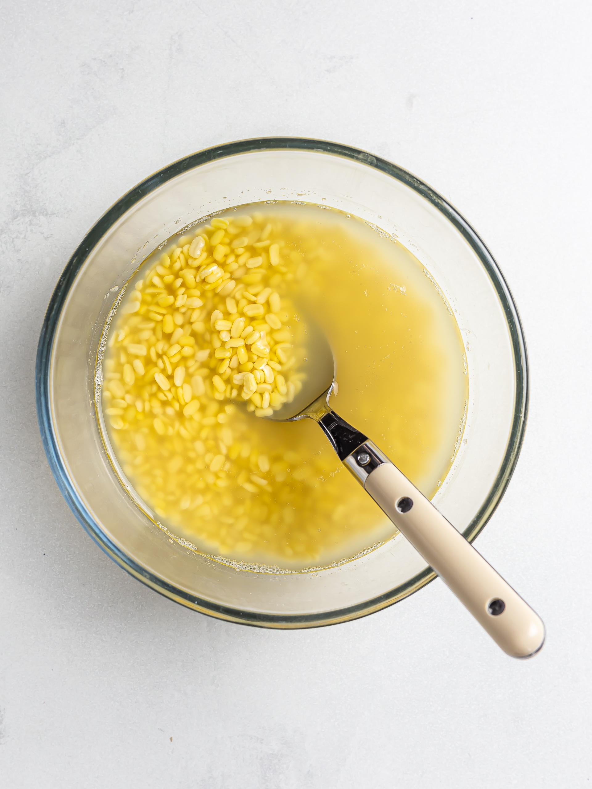 soaked mung dal in a bowl