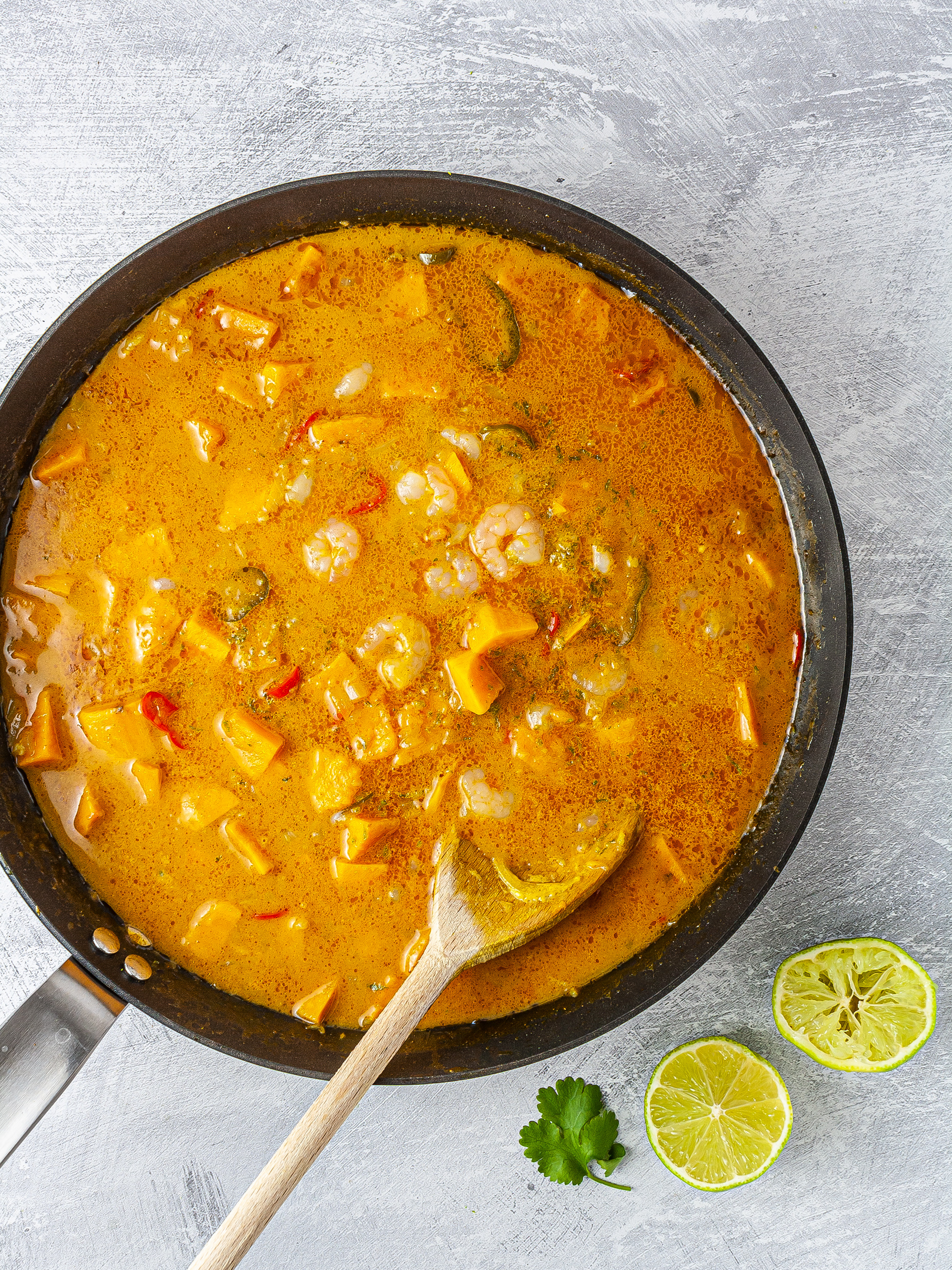 Lime juice, lime zest, and coriander in the prawn curry.