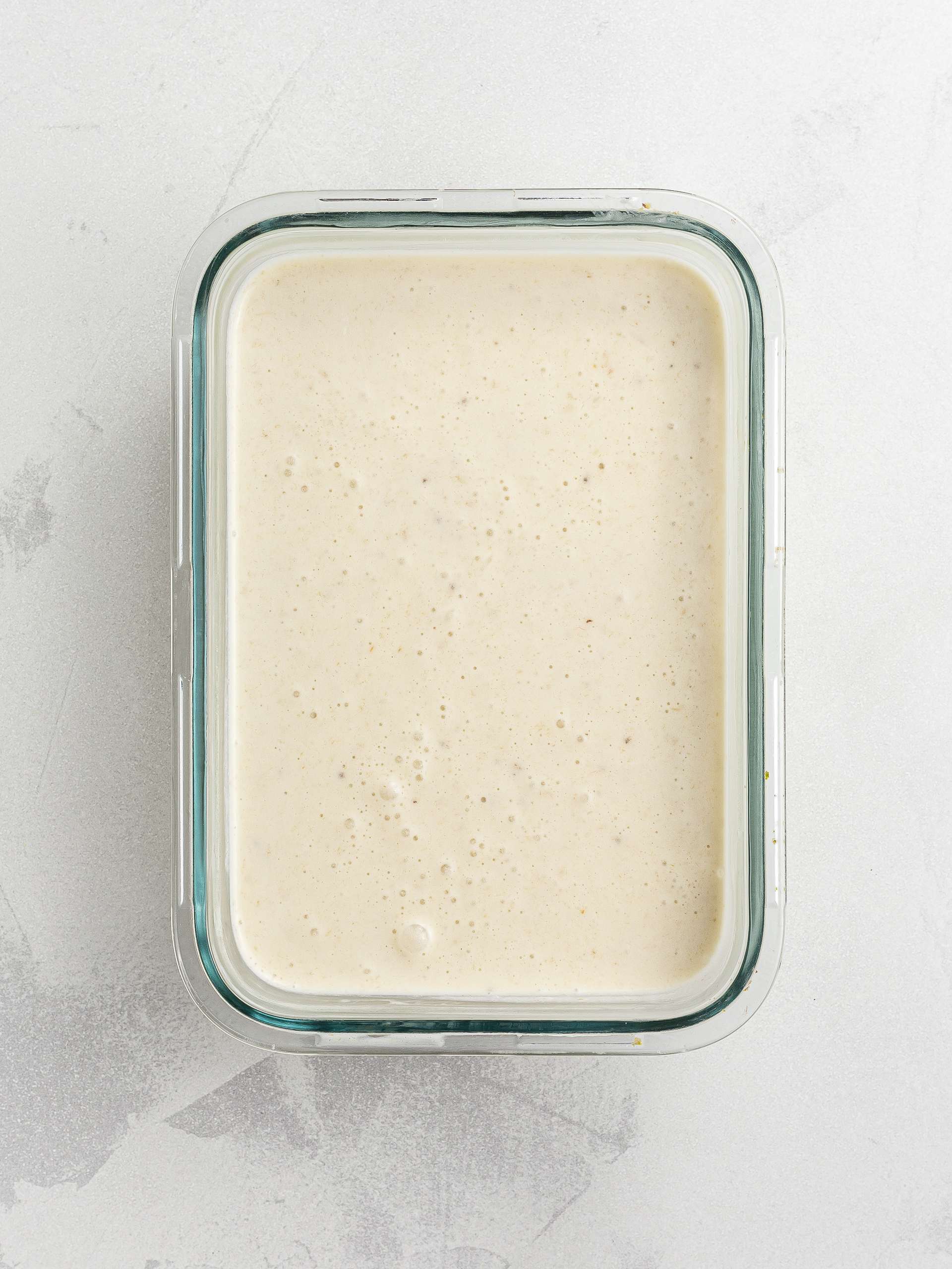 banana coconut ice cream in a container
