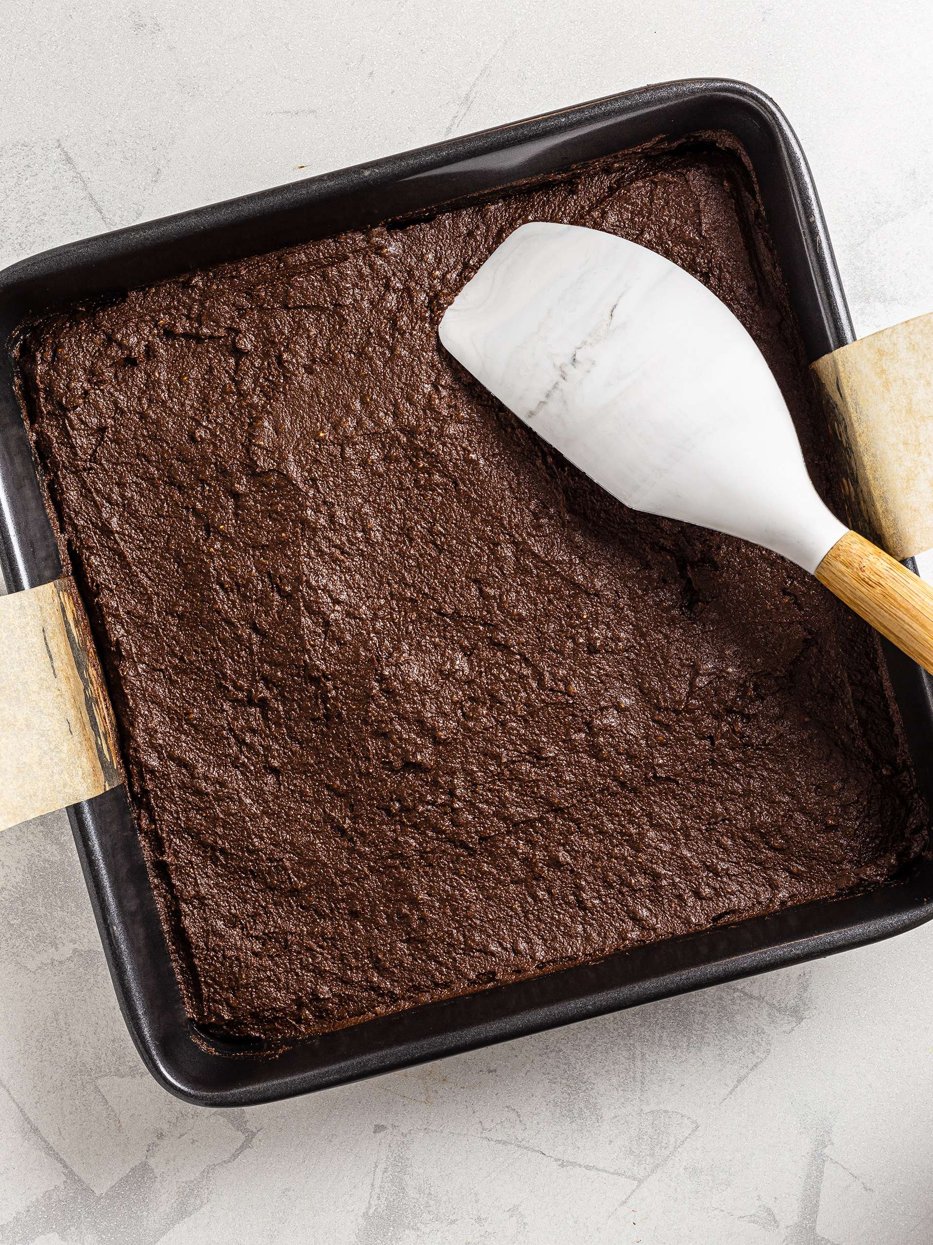 Brownie dough in baking pan
