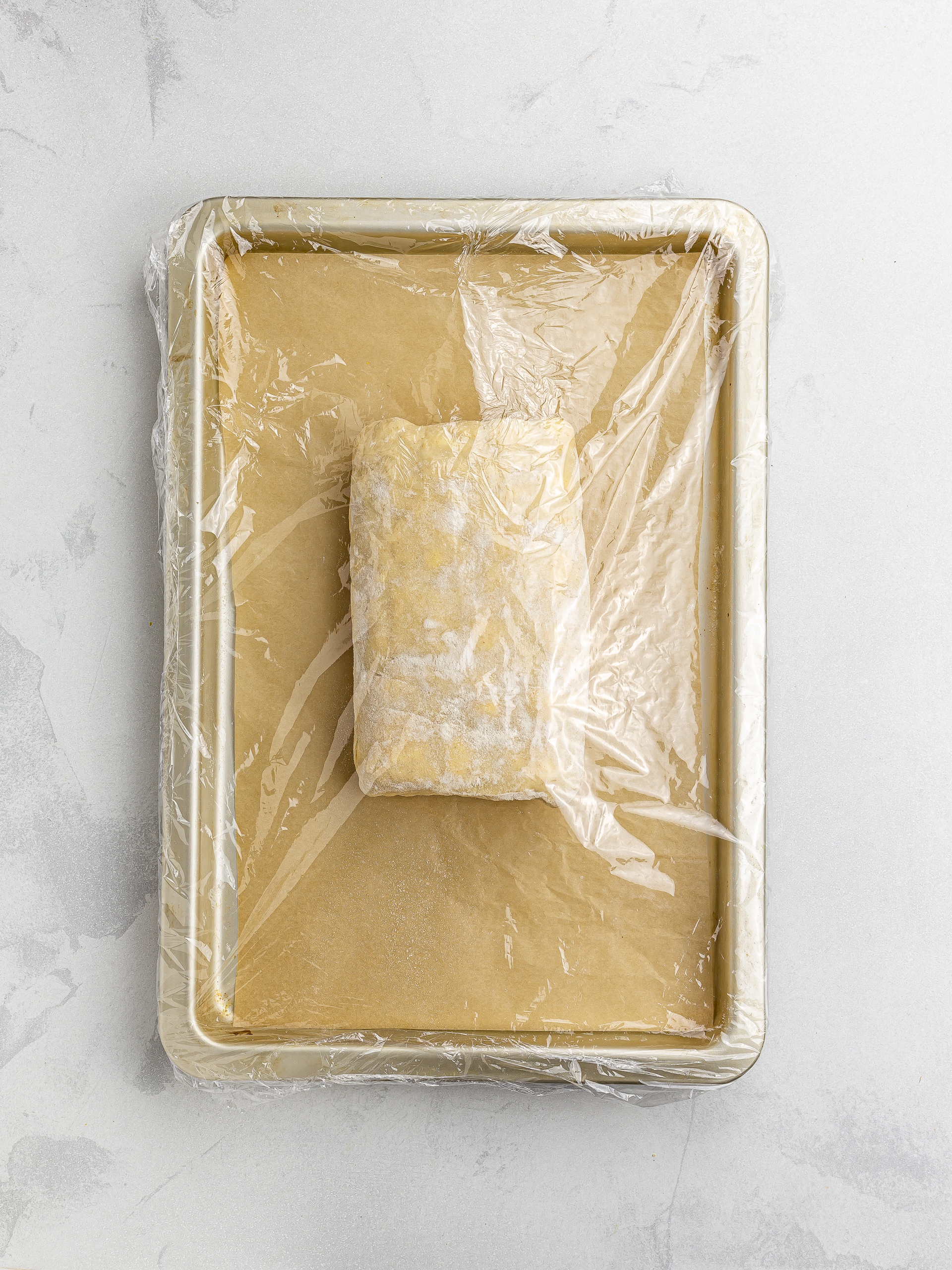 proving pastry dough on a tray