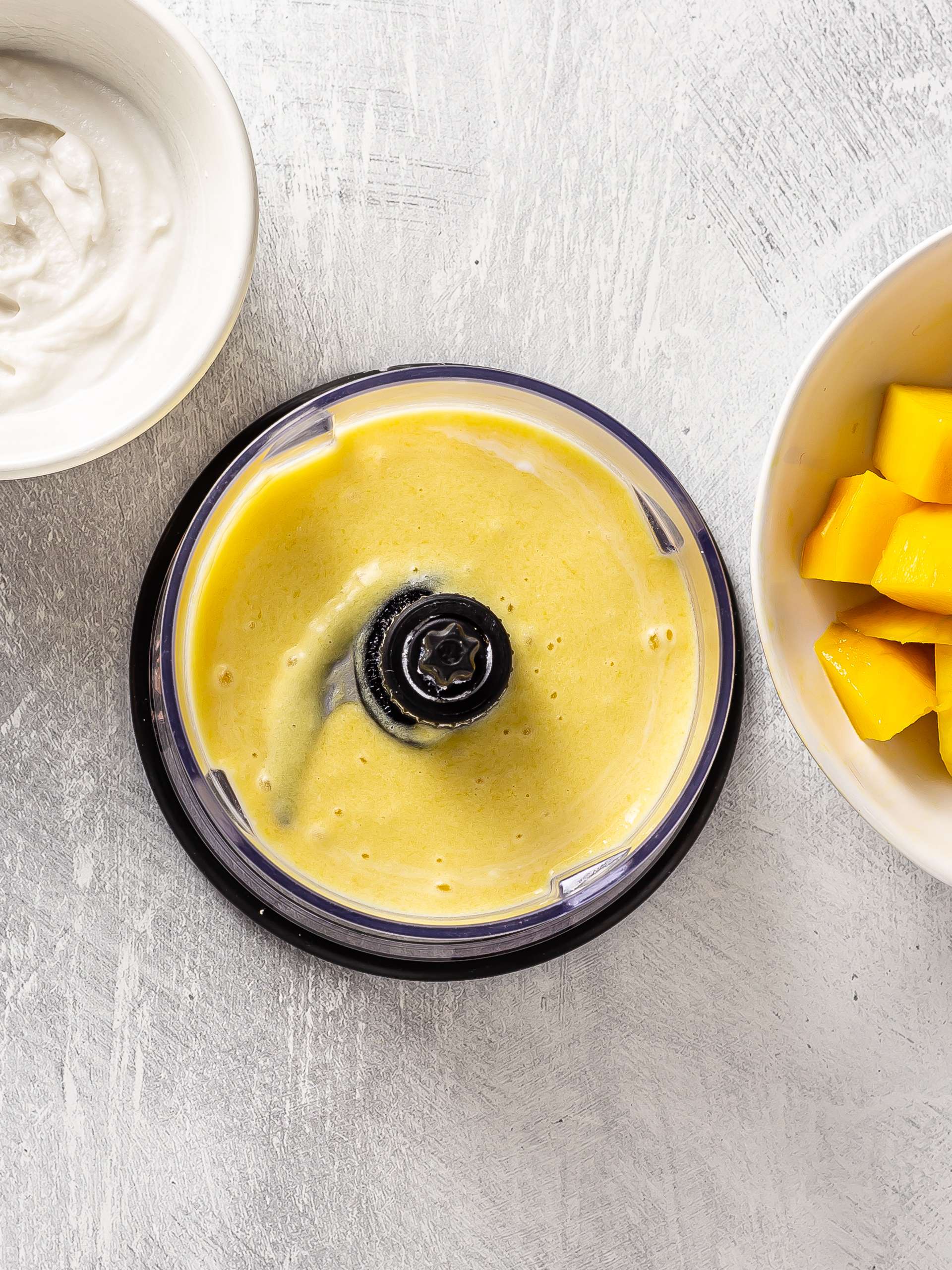 blended mango and coconut milk