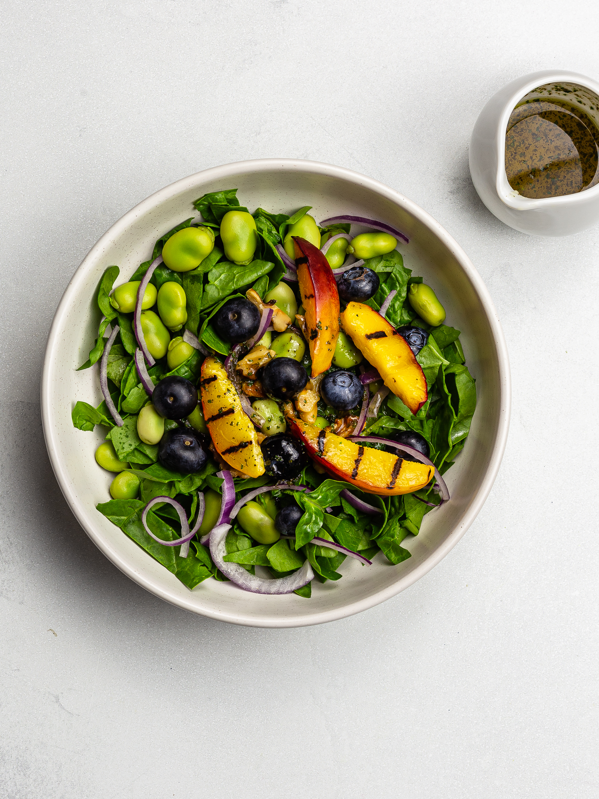 spinach salad with grilled peaches and blueberries