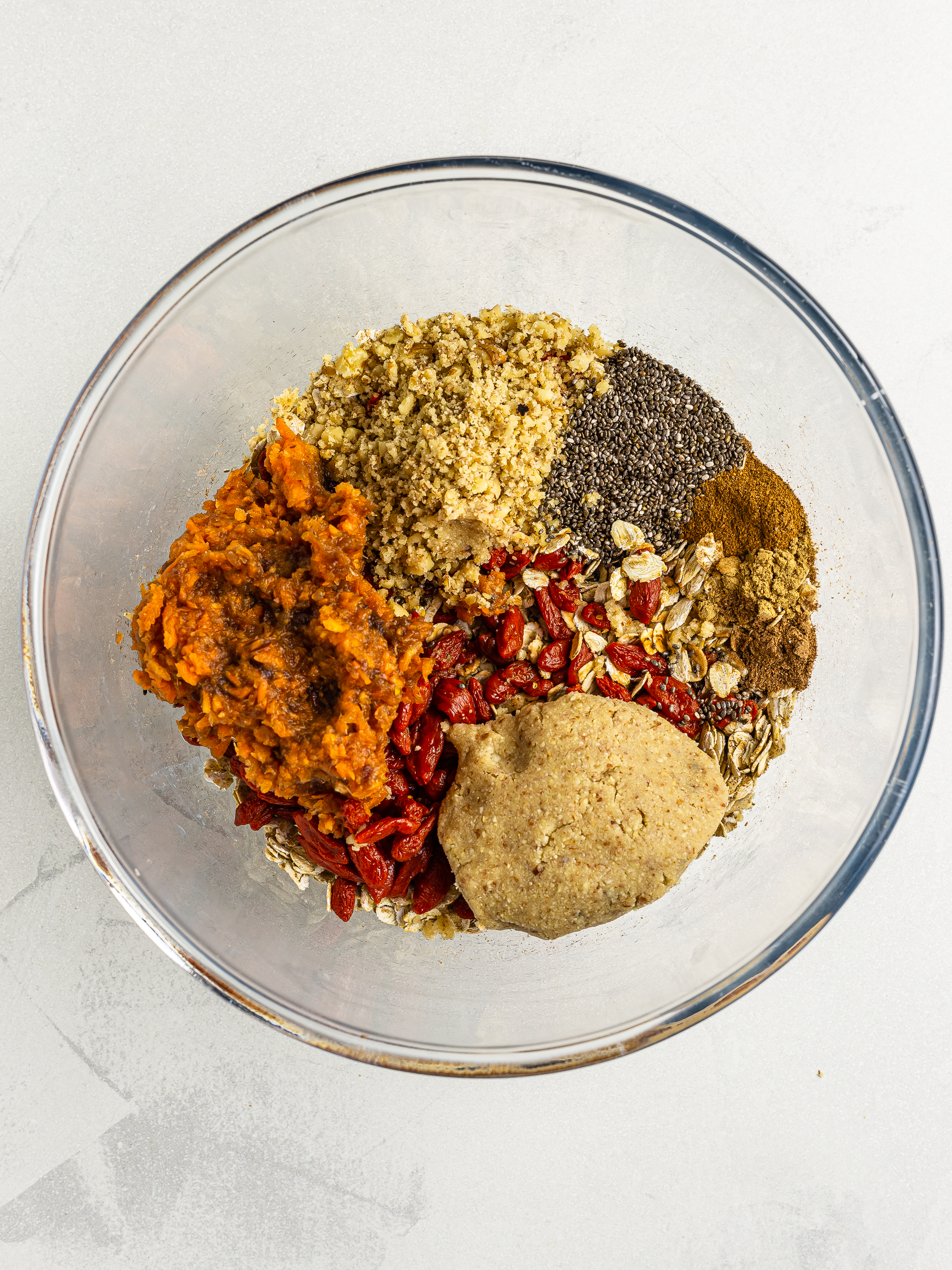 carrot cake energy balls ingredients in a bowl