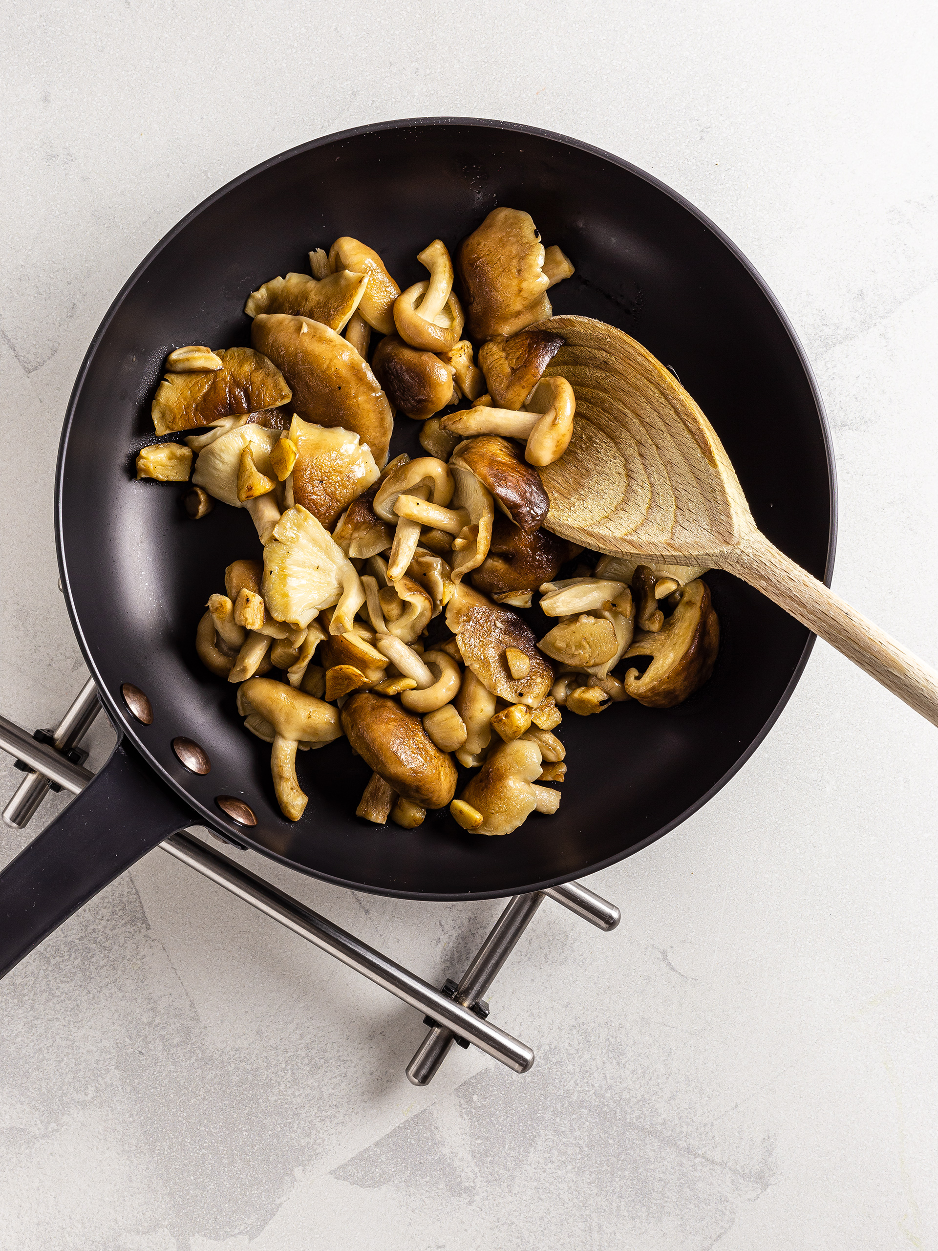 Sautéed shiitake mushrooms in a skillet