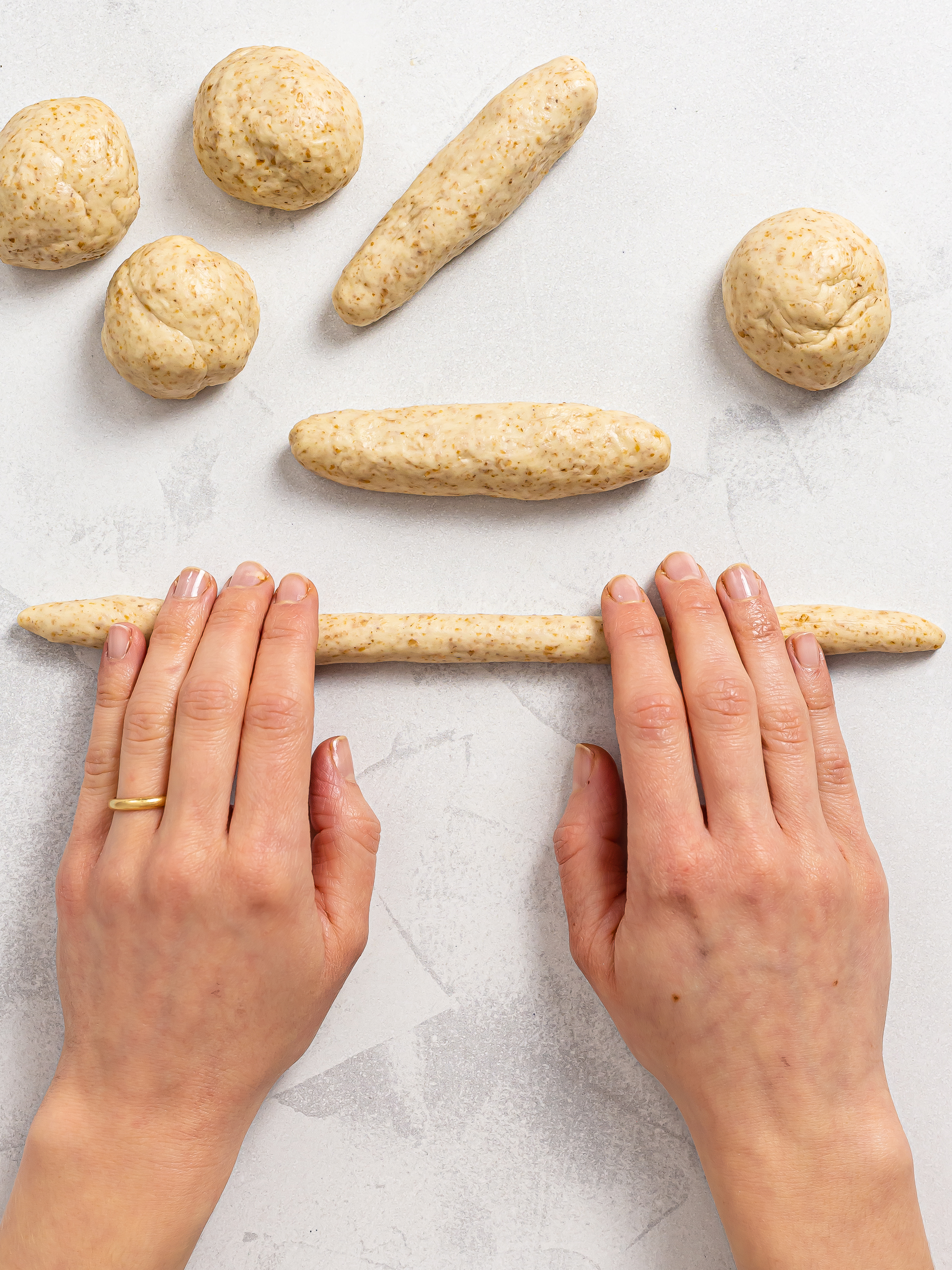 woman shaping breadsticks