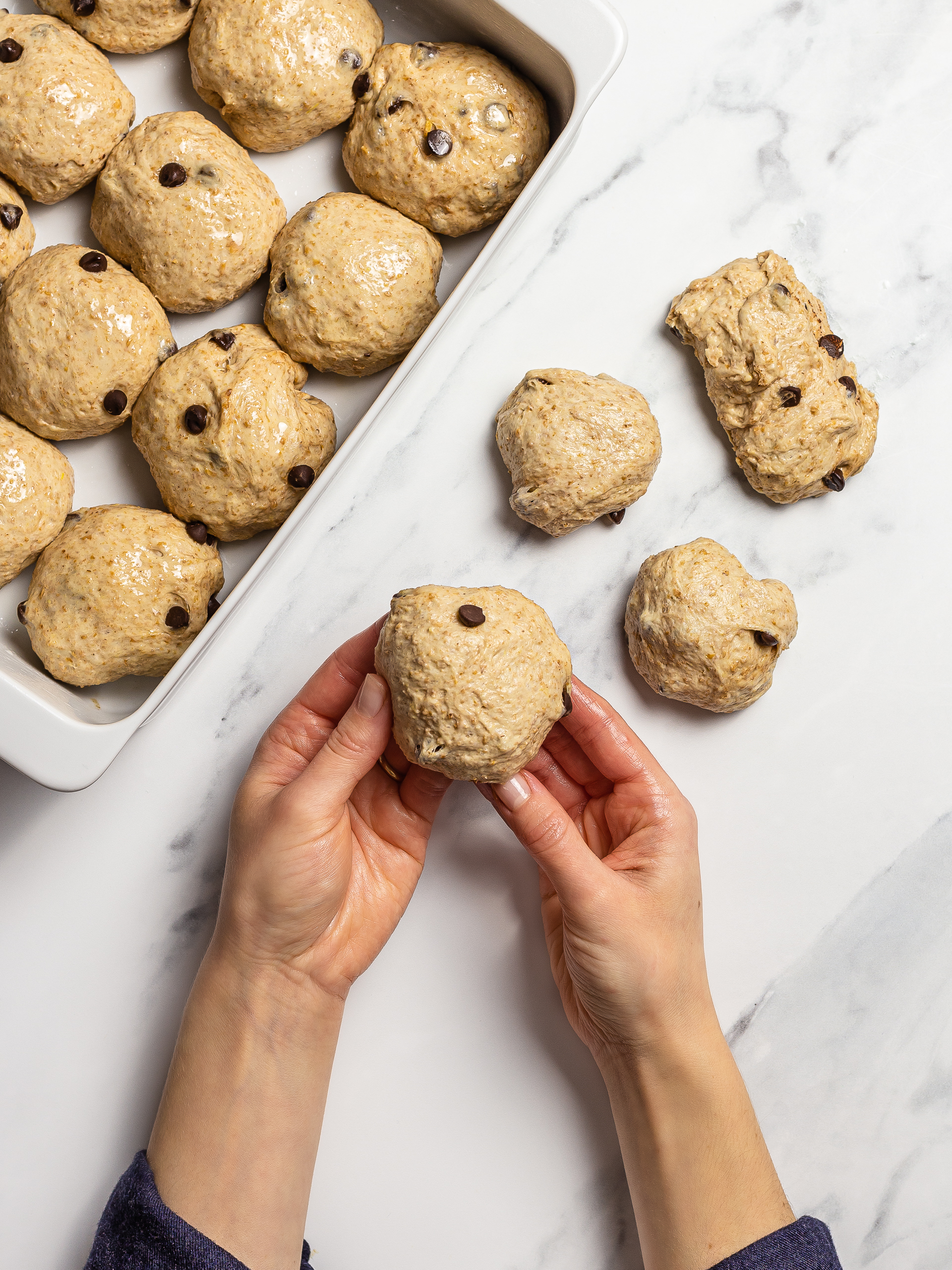 Shaping the chocolate chip brioche buns